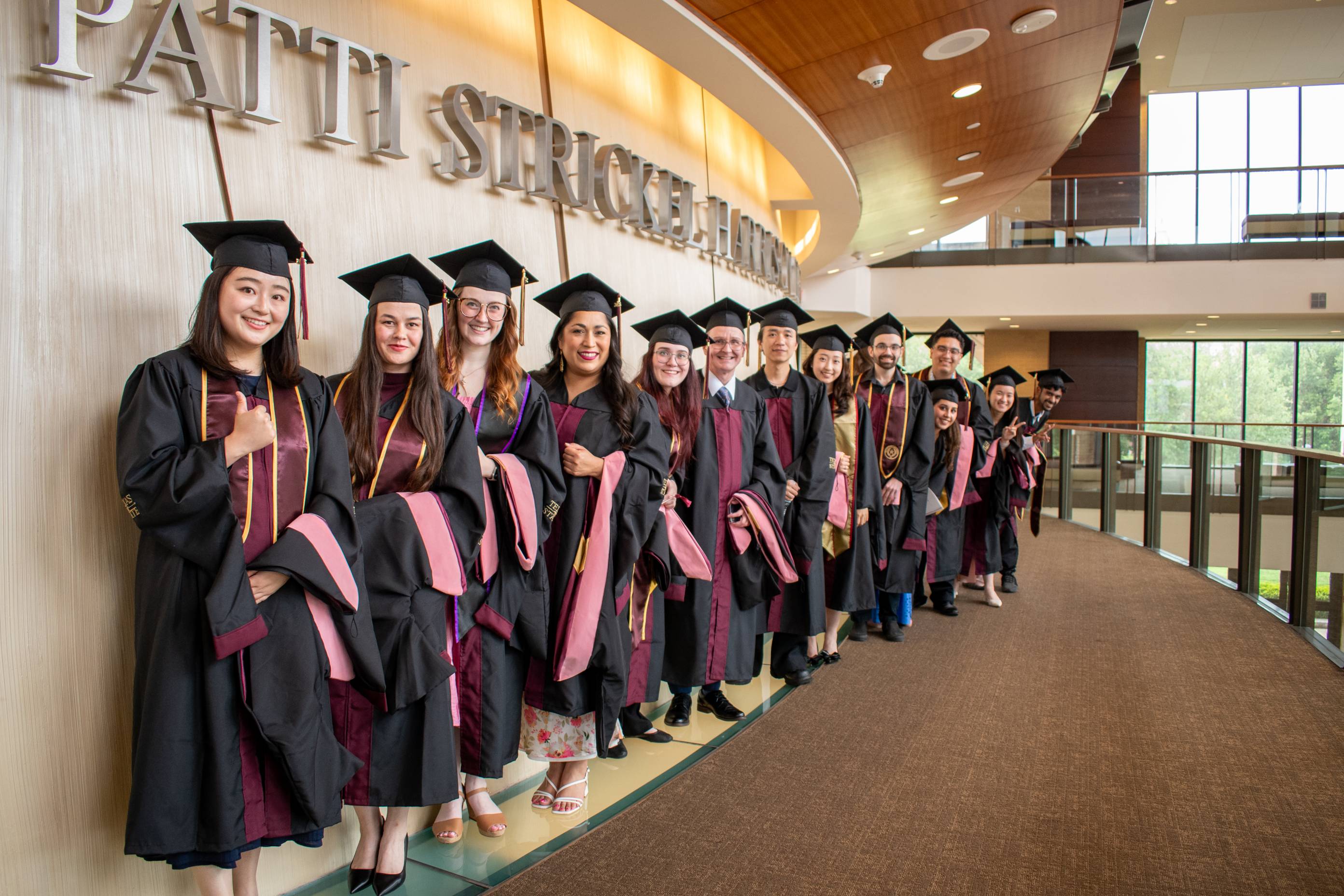 A group photo of some of the Masters Hooding Students