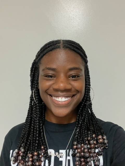 Headshot of McKayla Thomas smiling.