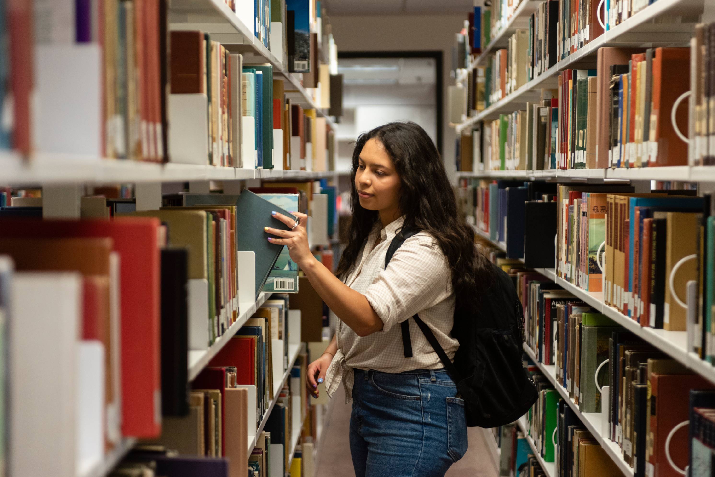 student looking for a book