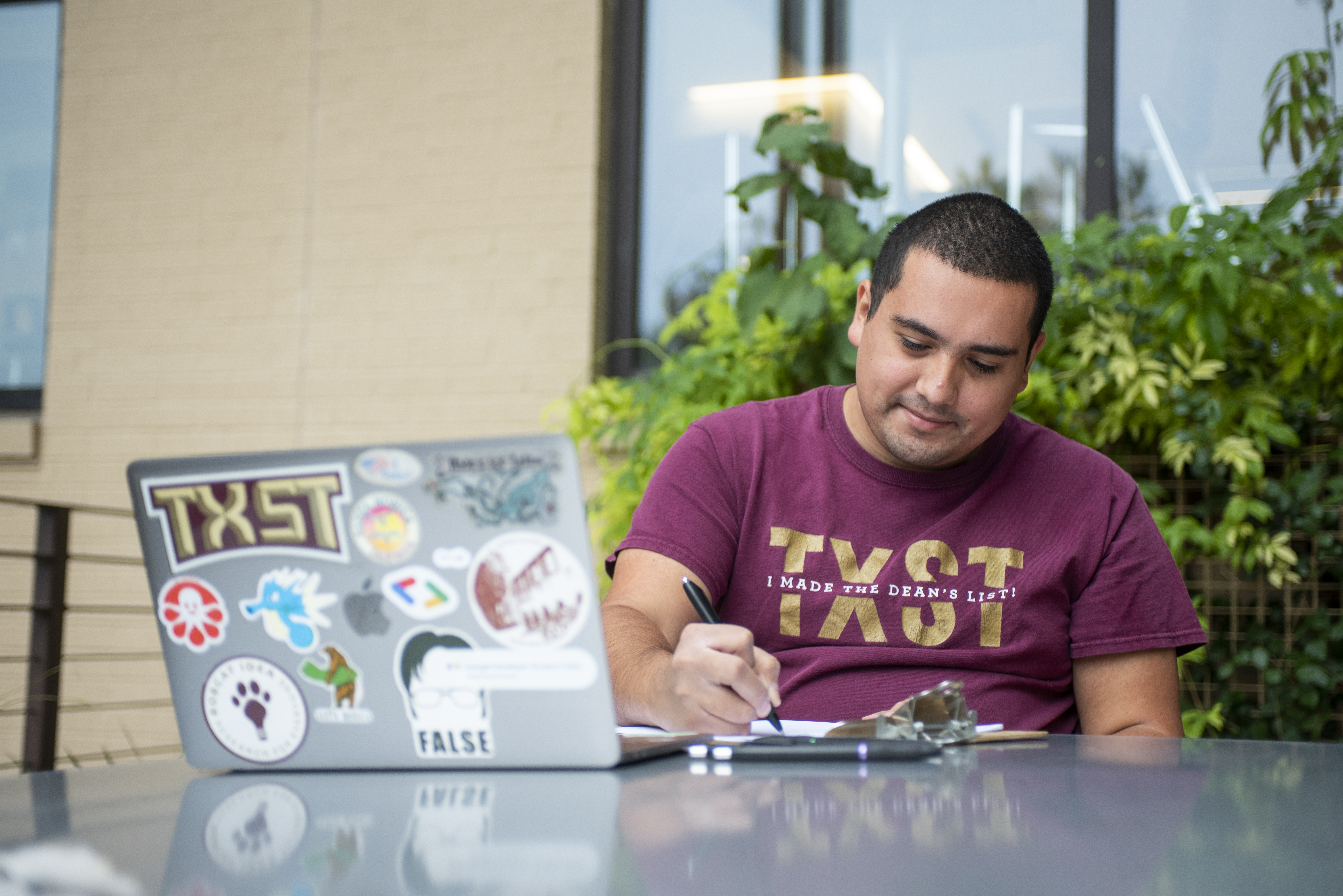 student working on laptop