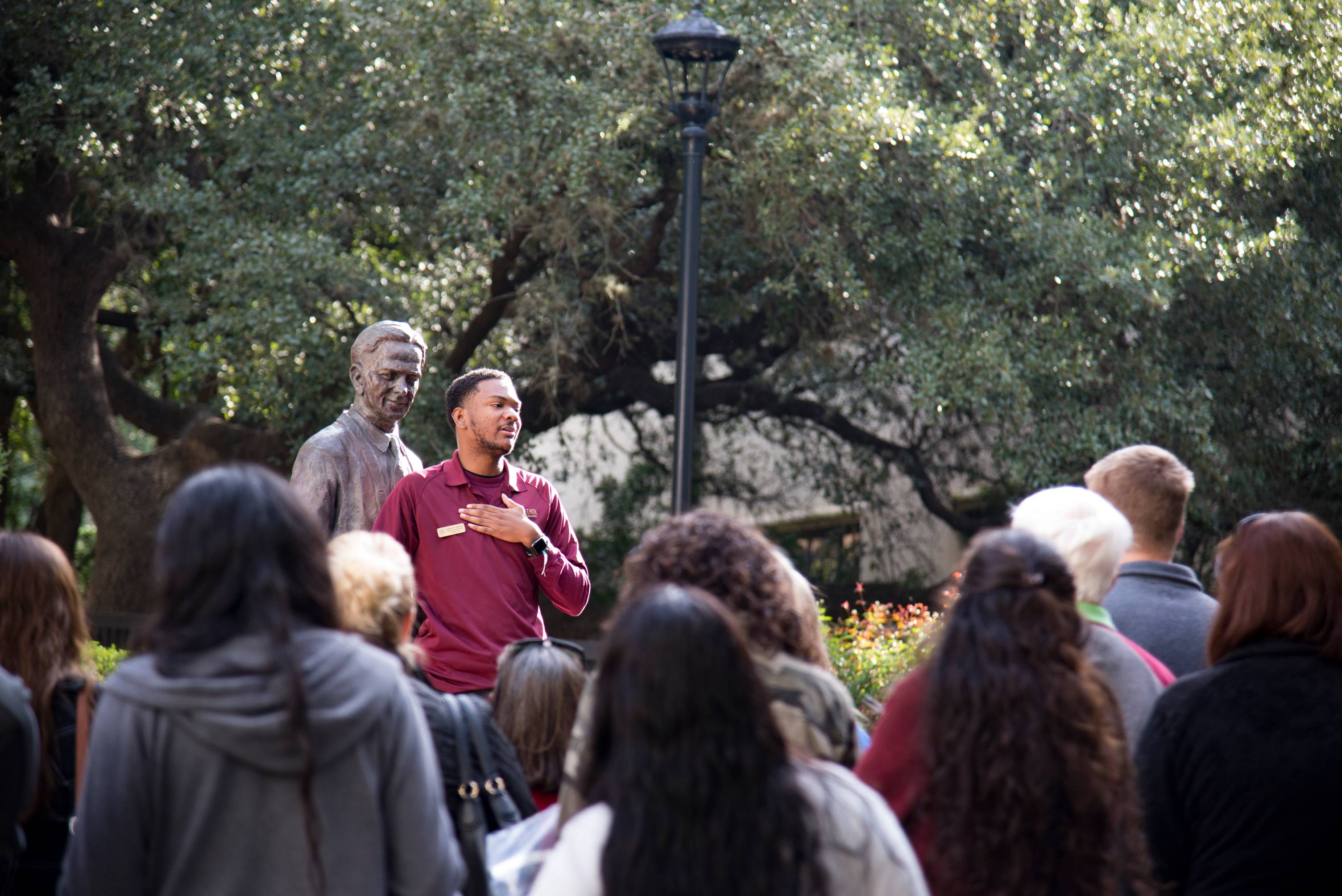 student leading a campus tour