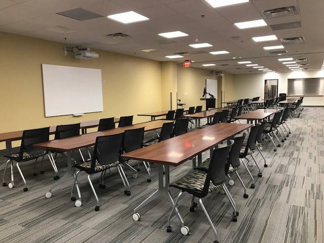 combined rooms with tables in seminar style