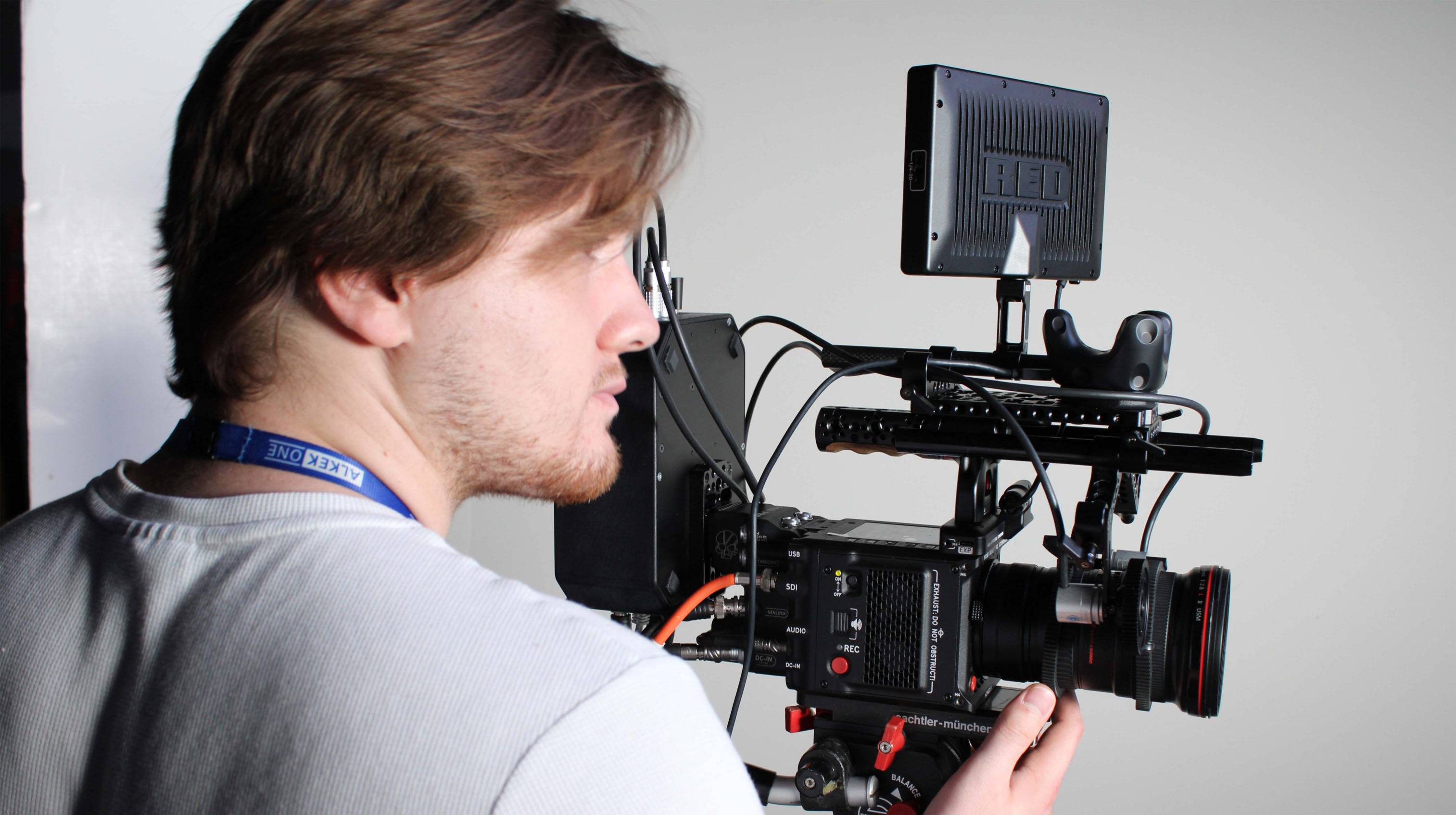 student with a recording camera