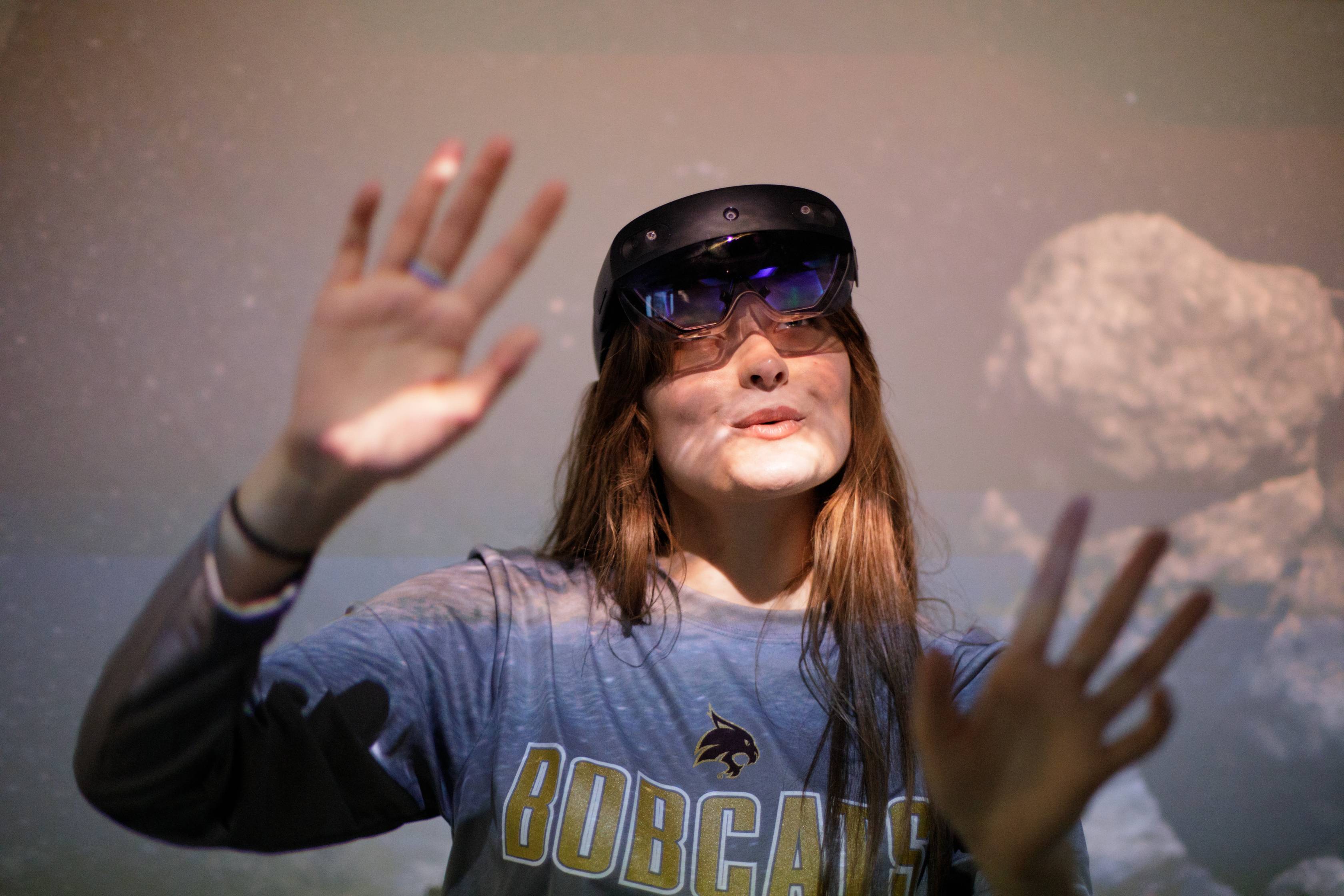 Student interacting with a VR