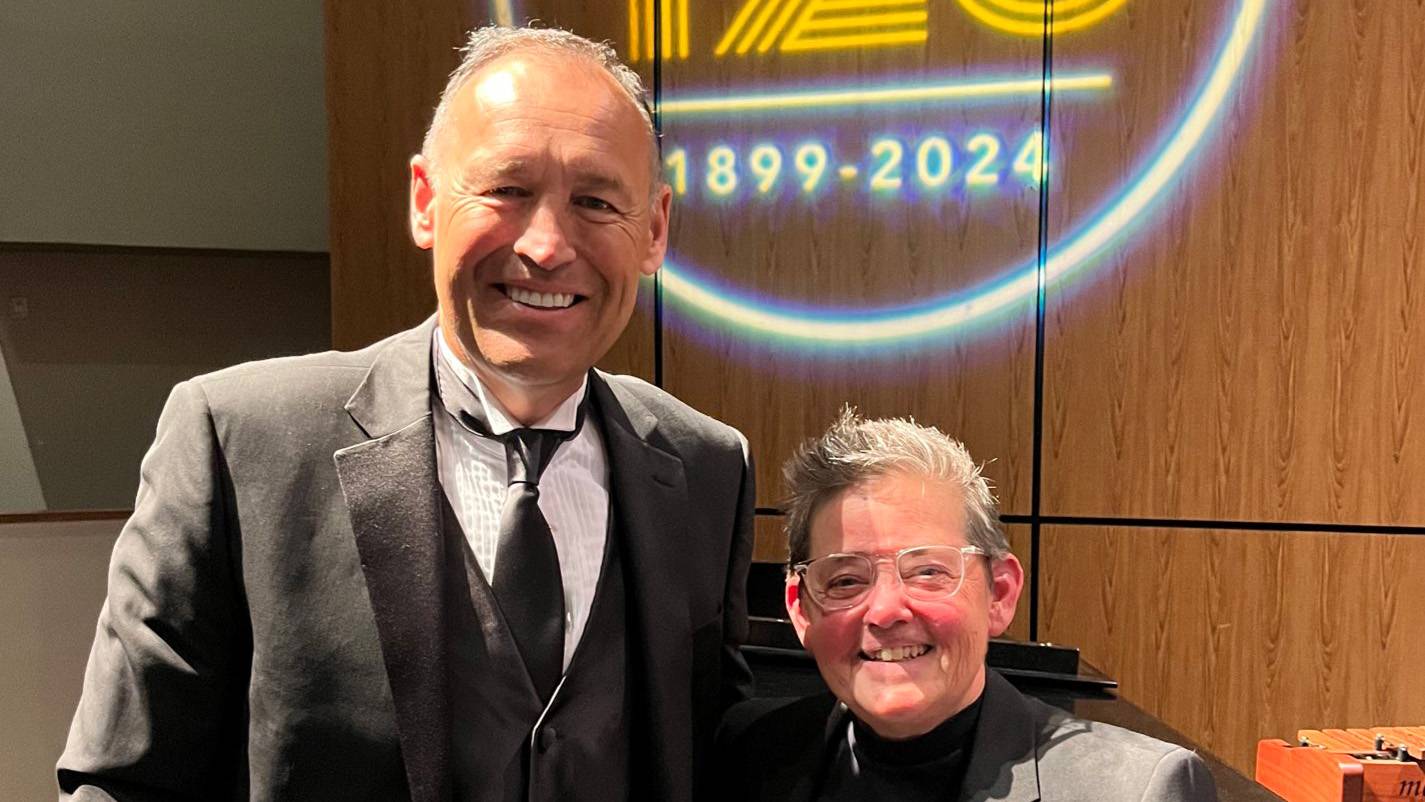 President Kelly Damphousse (left) poses for a photo with Caroline Beatty.