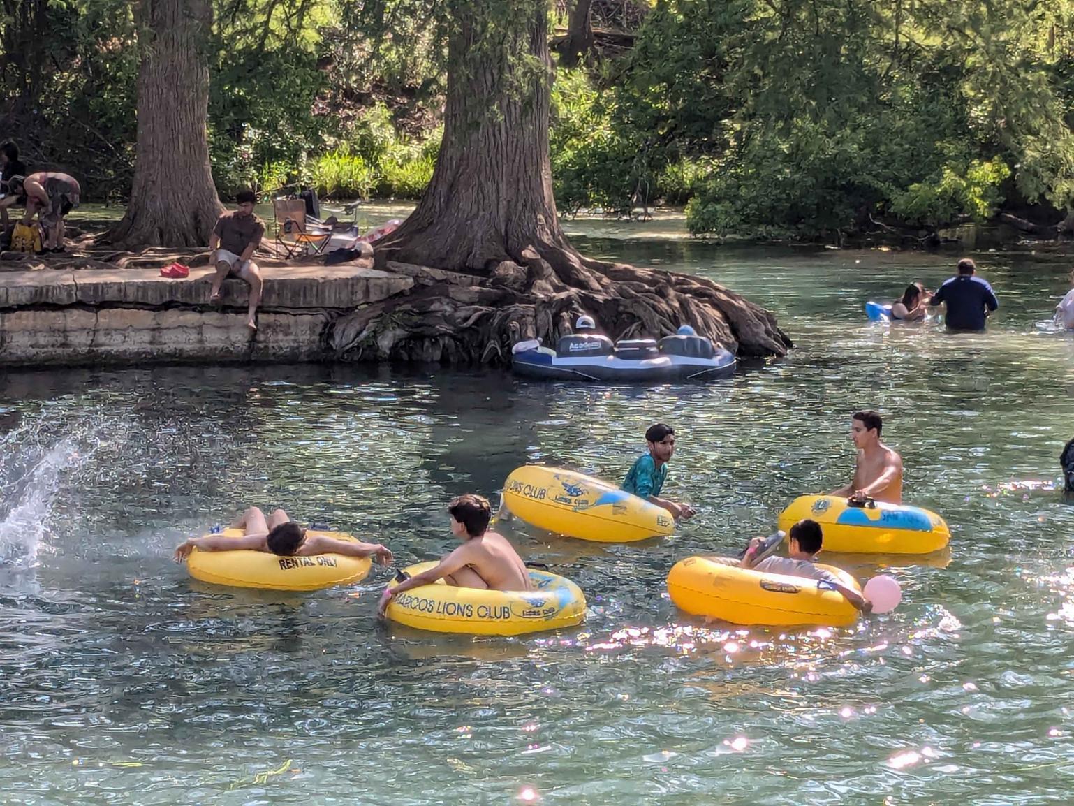 4 HSMC students in tubes on the river