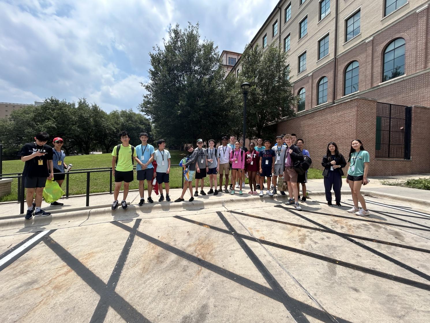 Several JSMCr students standing outside before going to dining hall for lunch