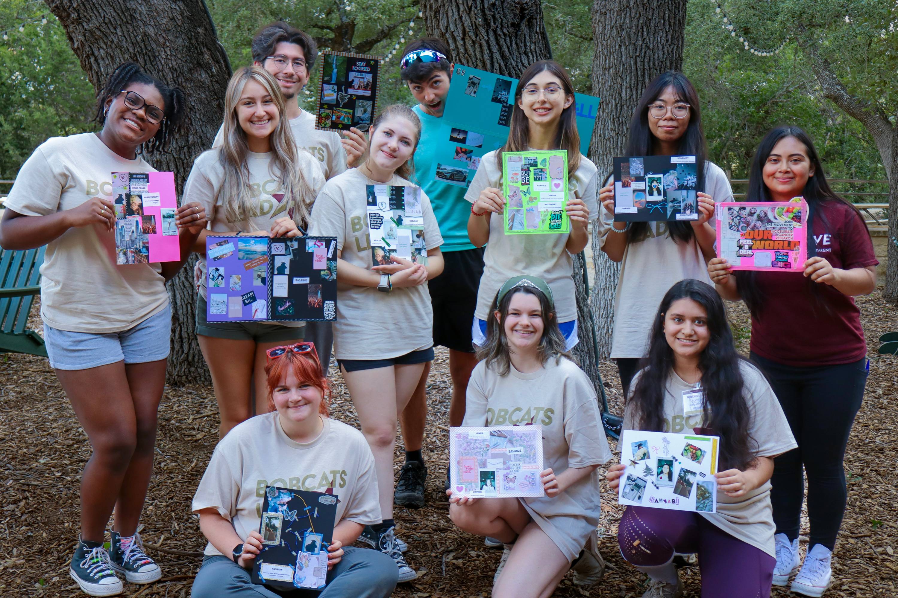 Group of students showcasing vision boards