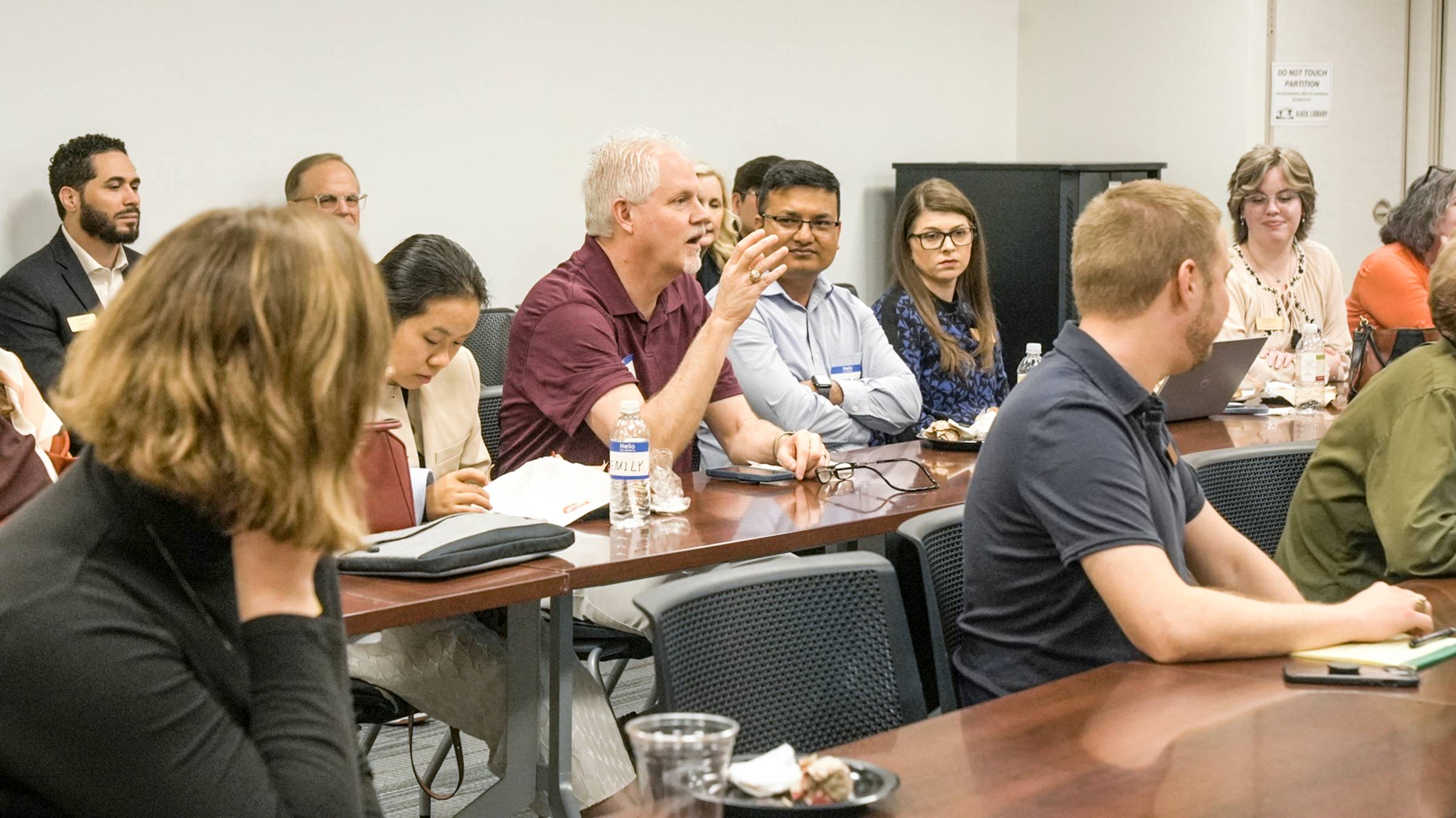 An image of Dr. Rodney Rhode asking a question at the HRRN meeting.