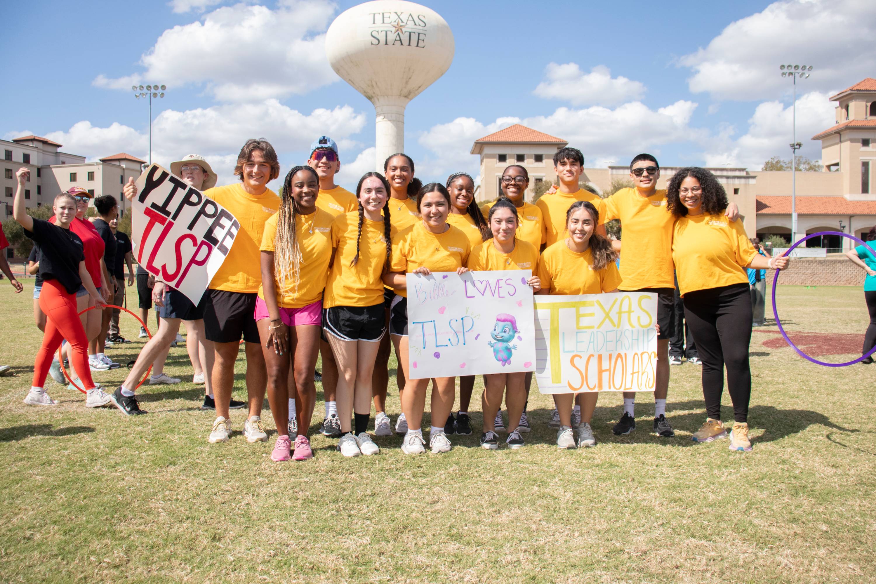 students in yellow shirts represent TLSP at field day