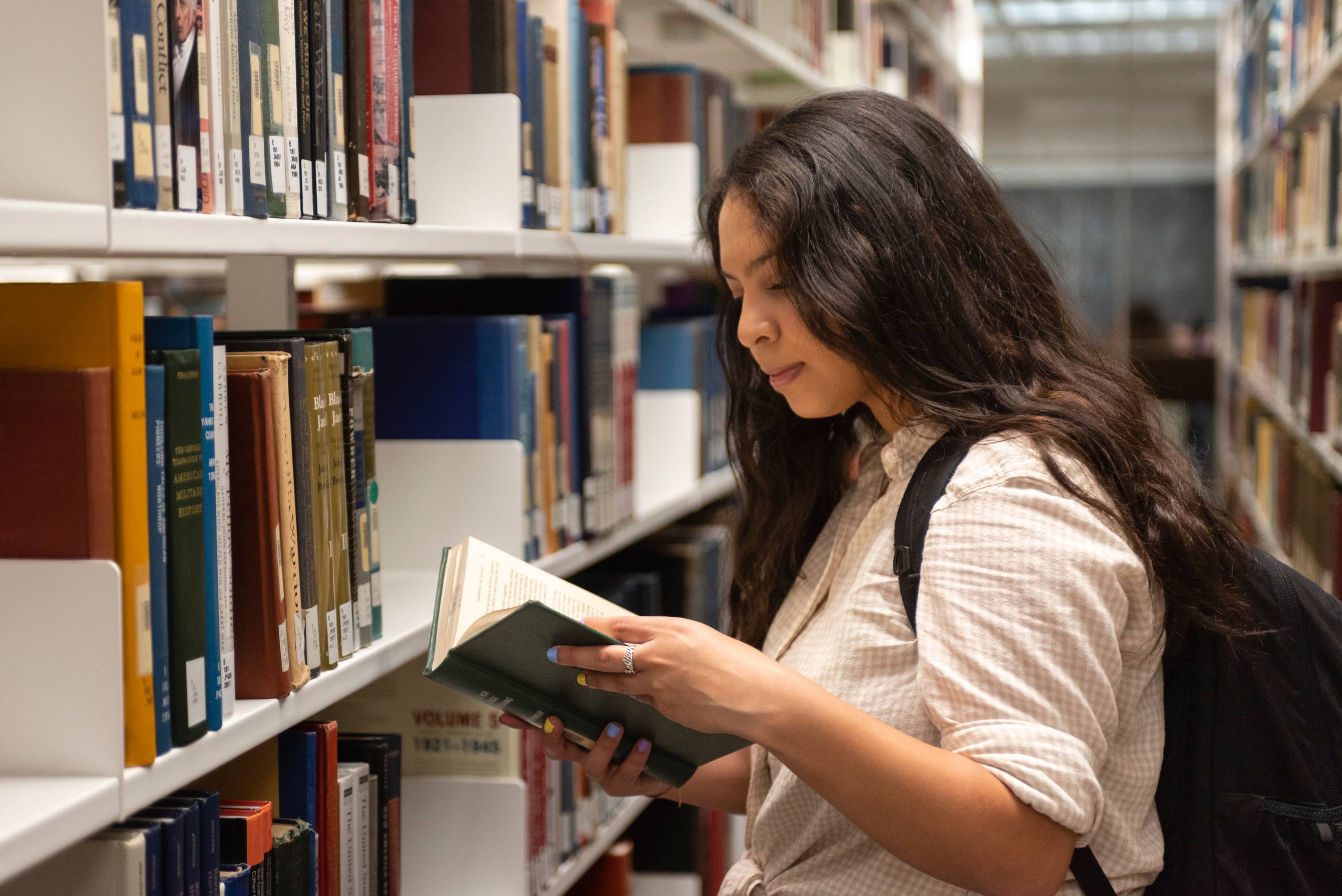 Student reading a book