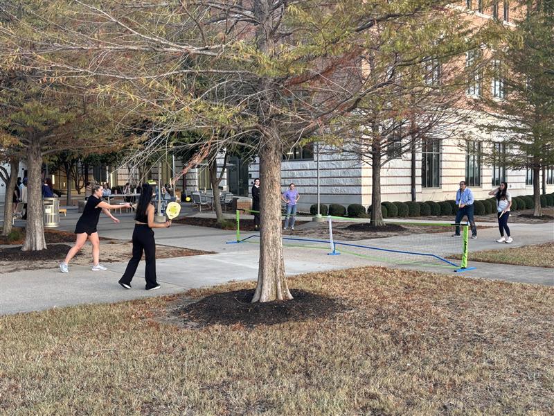 CDIS faculty and students playing Pickleball