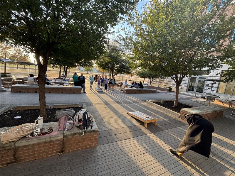 CDIS students playing Corn Holes.