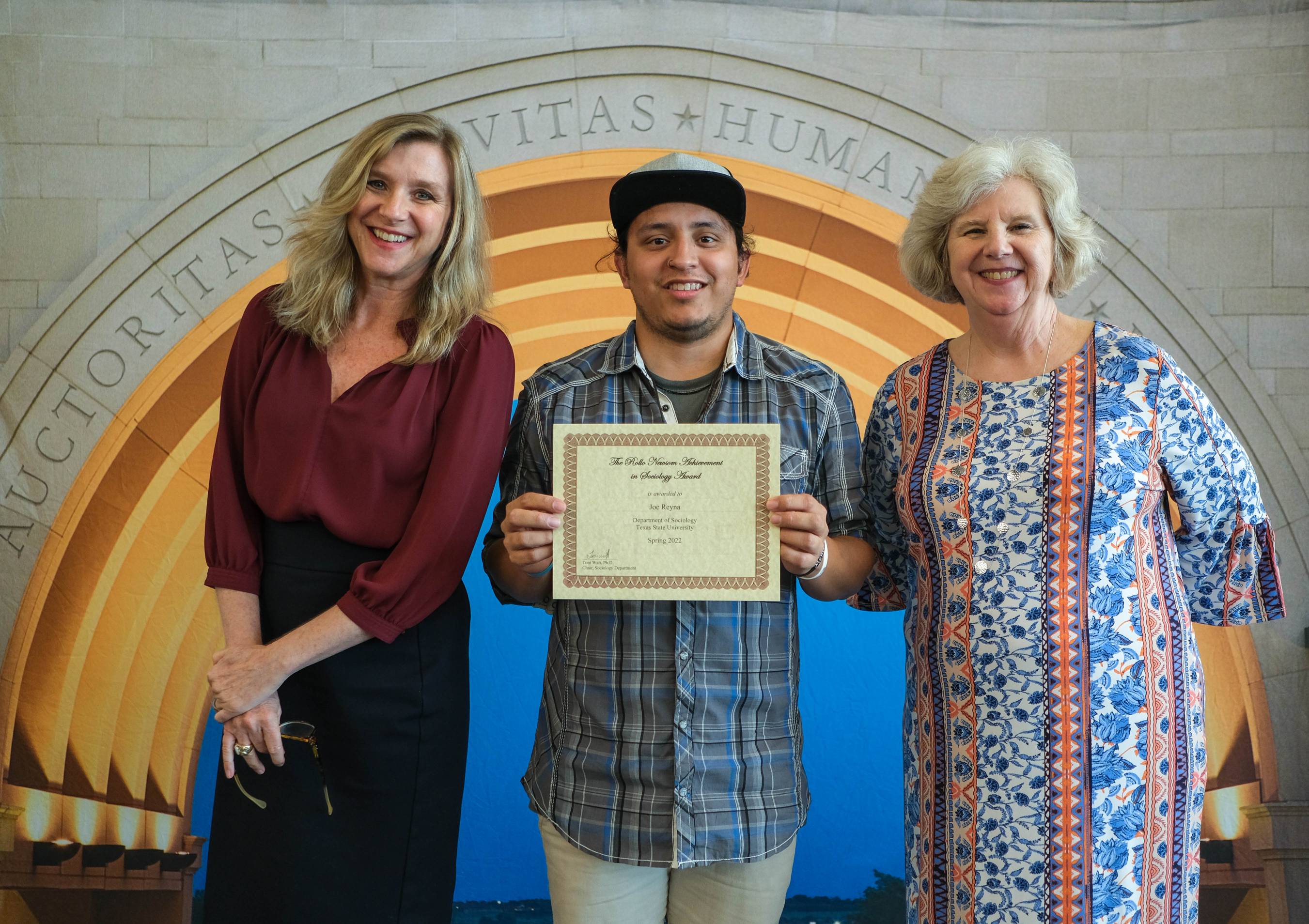 Picture of a student receiving an award