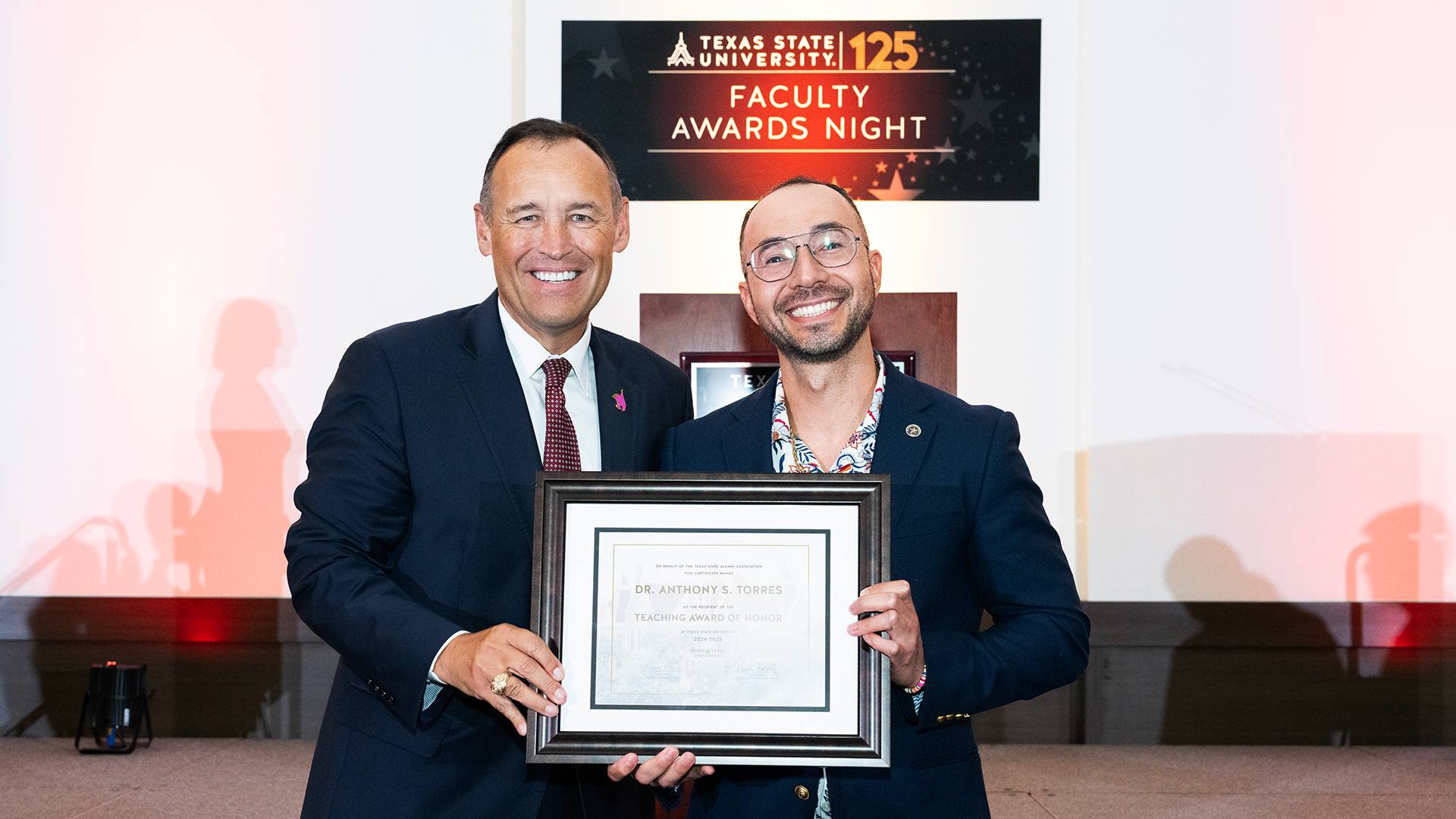 Kelly Damphousse and Anthony Torres with the Teaching Award of Honor