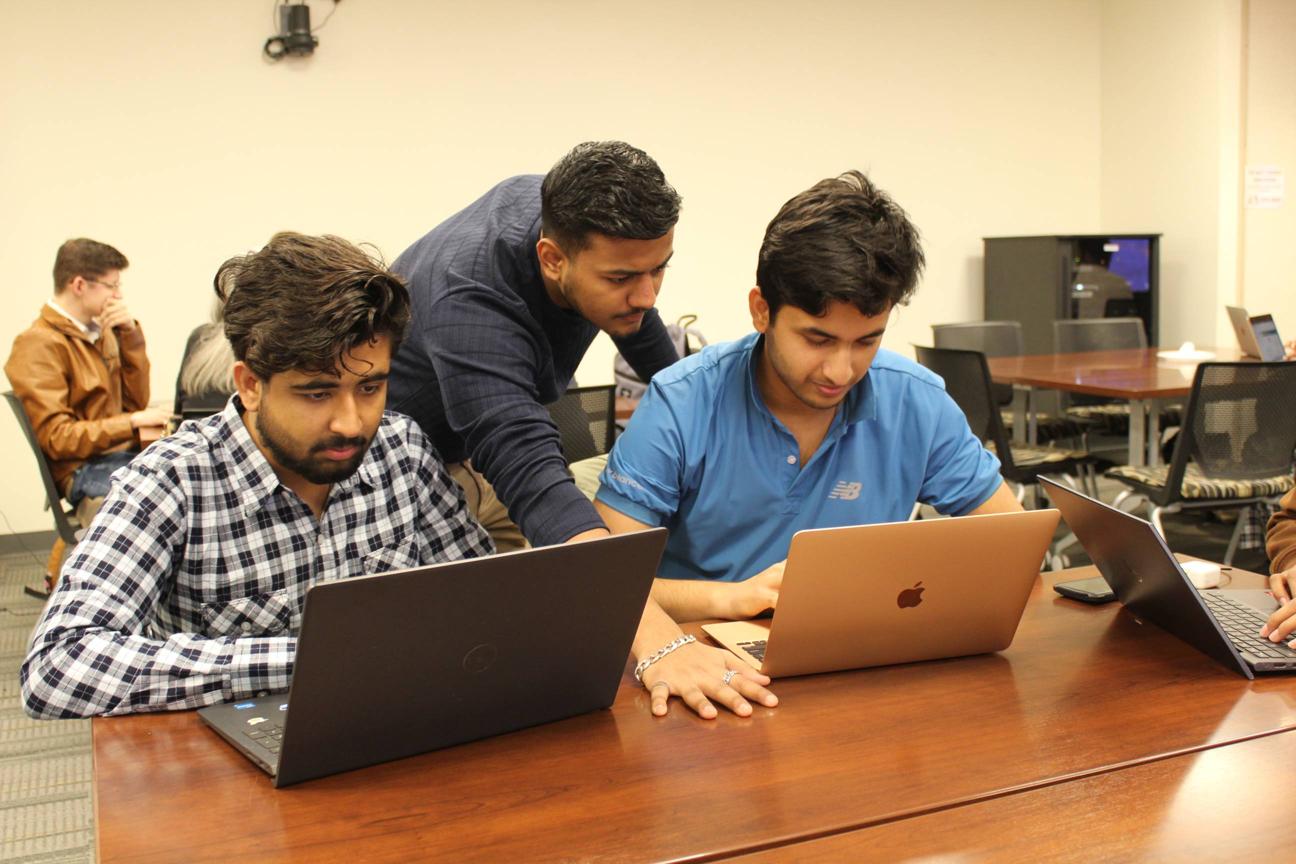 students working on final presentation