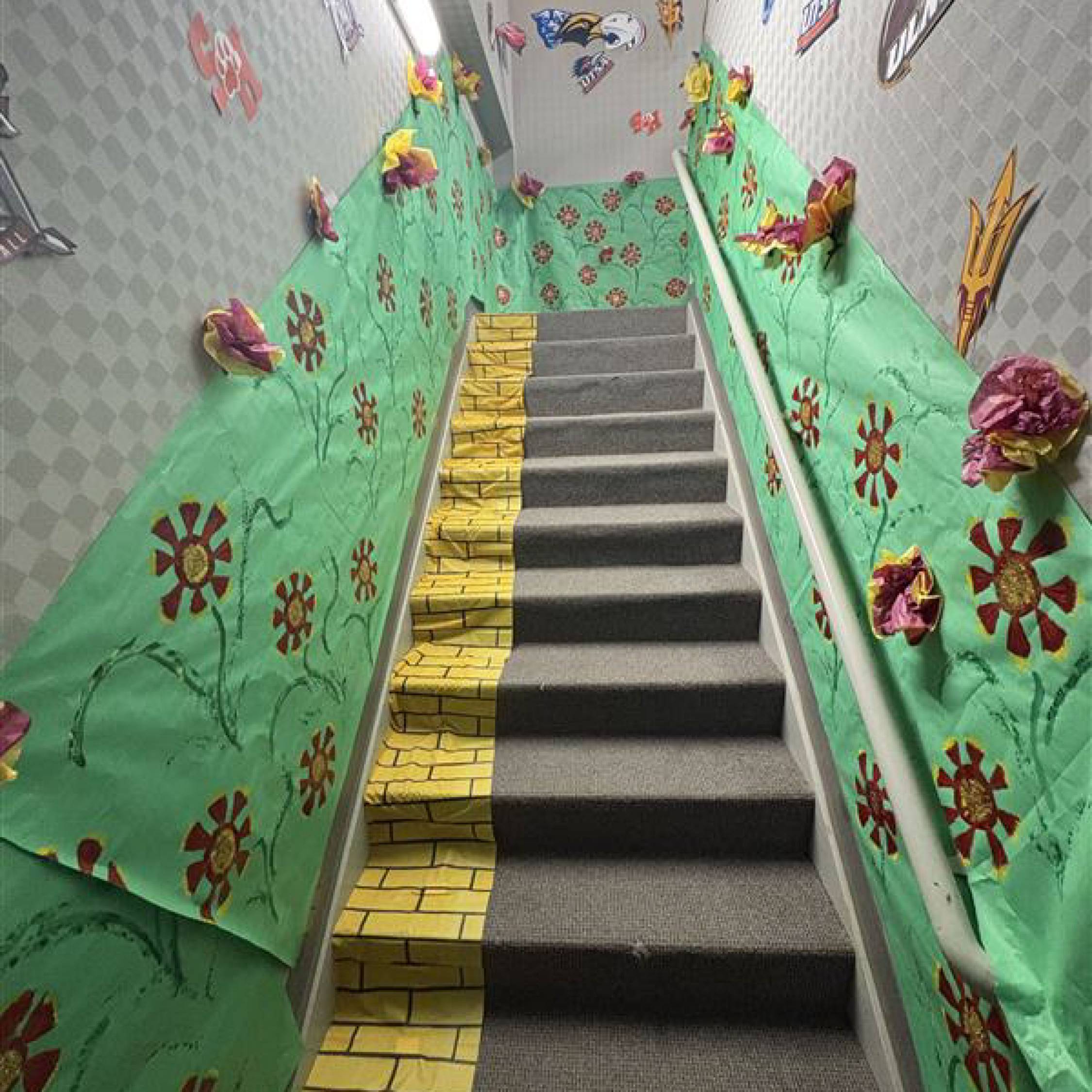 Hallway Decorated as the Wizard of Oz TXST edition. A field of gaillardias (made of paper) along the wall. 