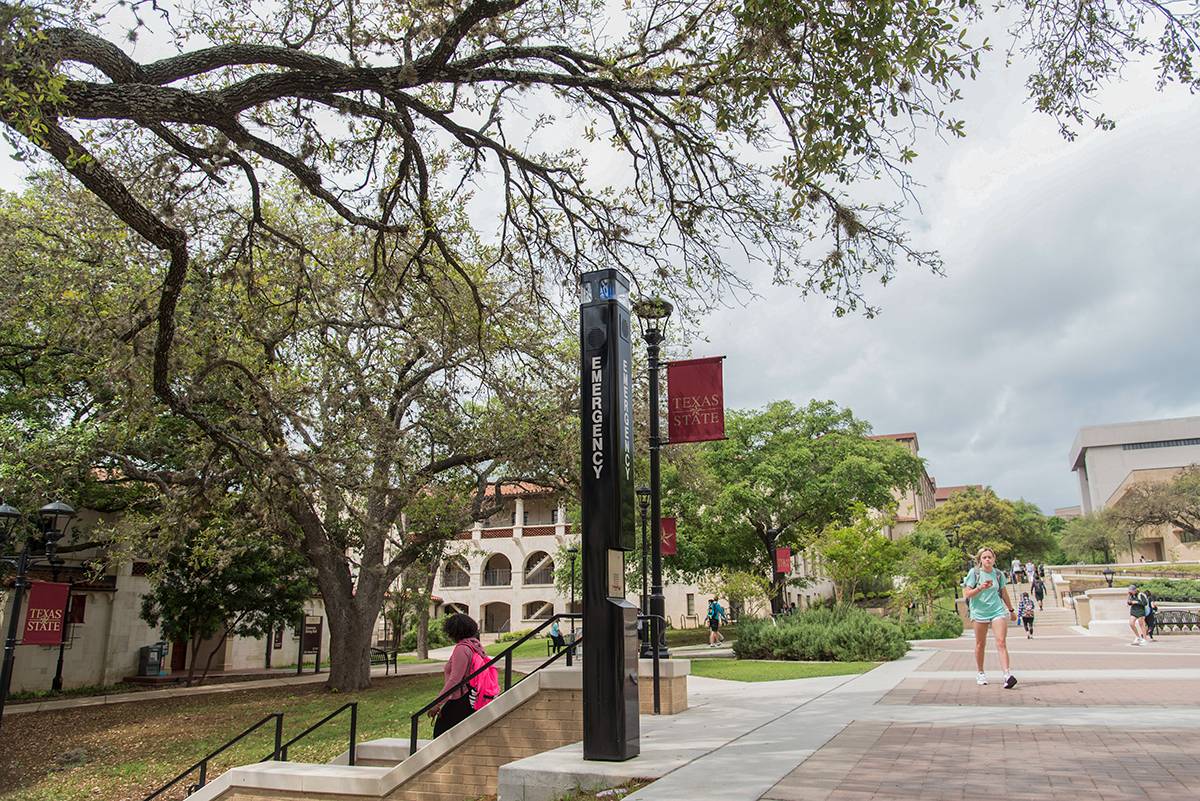 students walking on a college campus