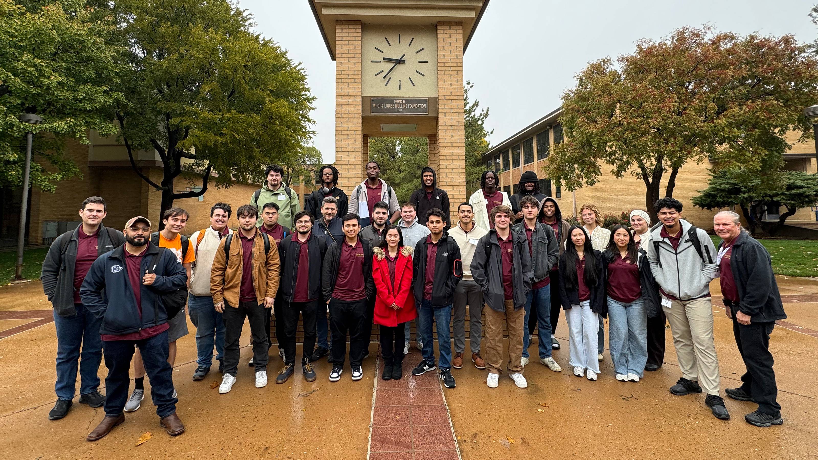 29 students from Texas State University's ITSA team posing outdoors