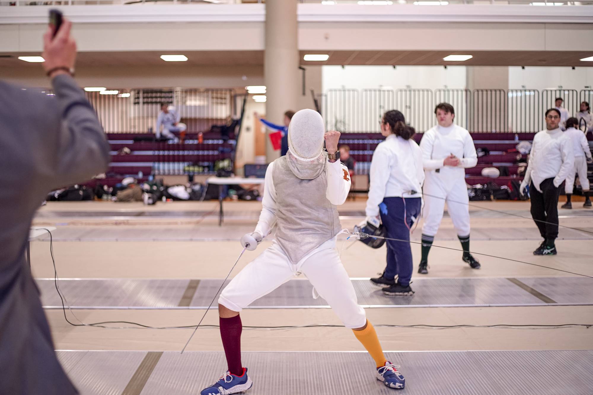 Fencing sport club member celebrating after a victory