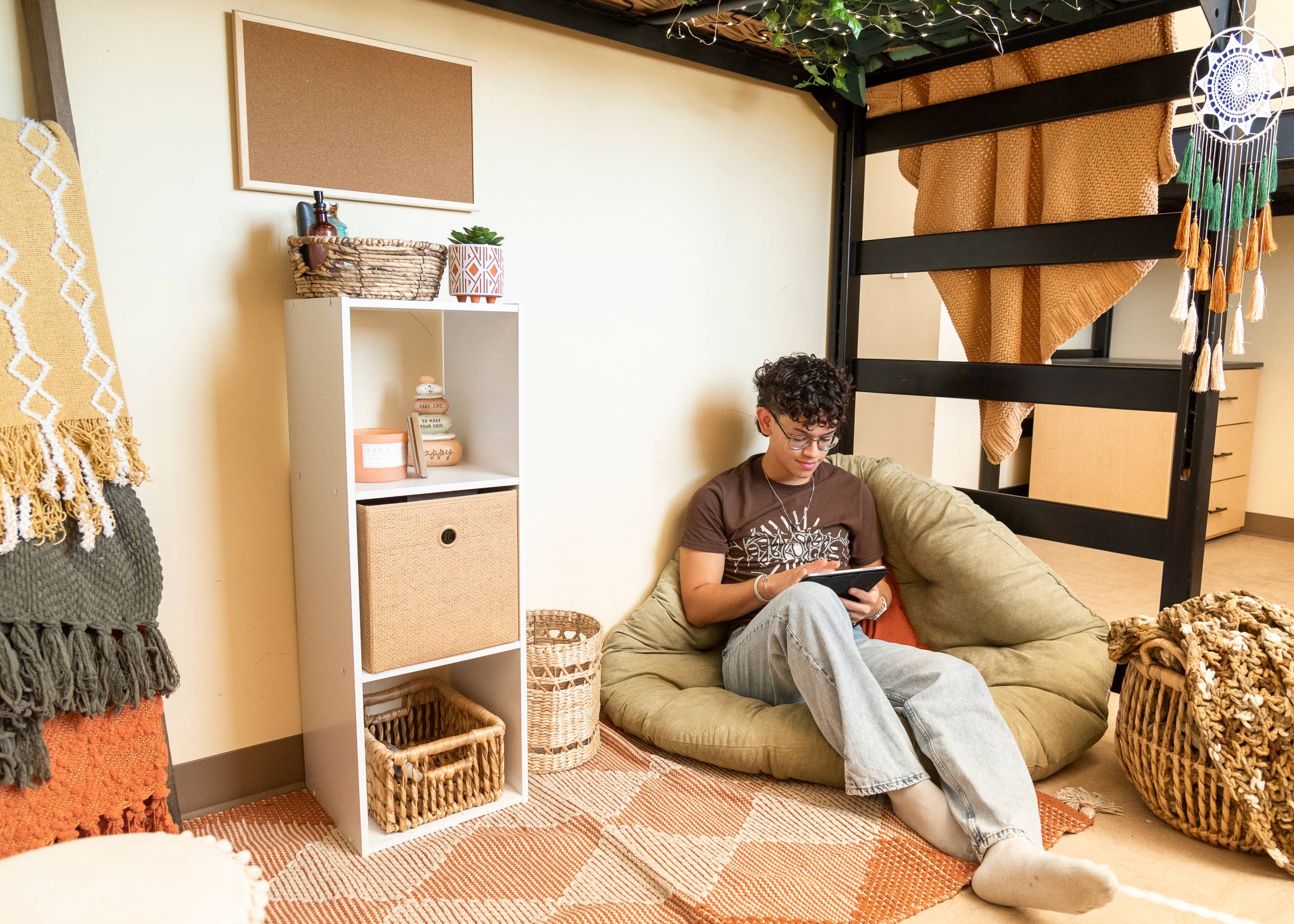 a person sitting on a bean bag reading