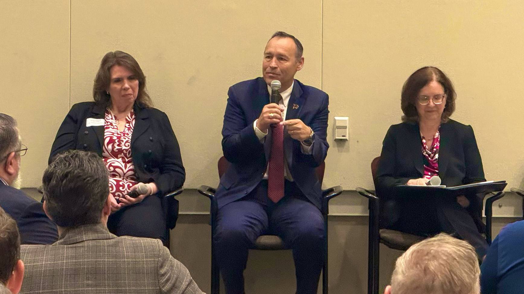 President Kelly Damphousse (middle) speaks on a panel during the Collin College Leadership Policy Summit.