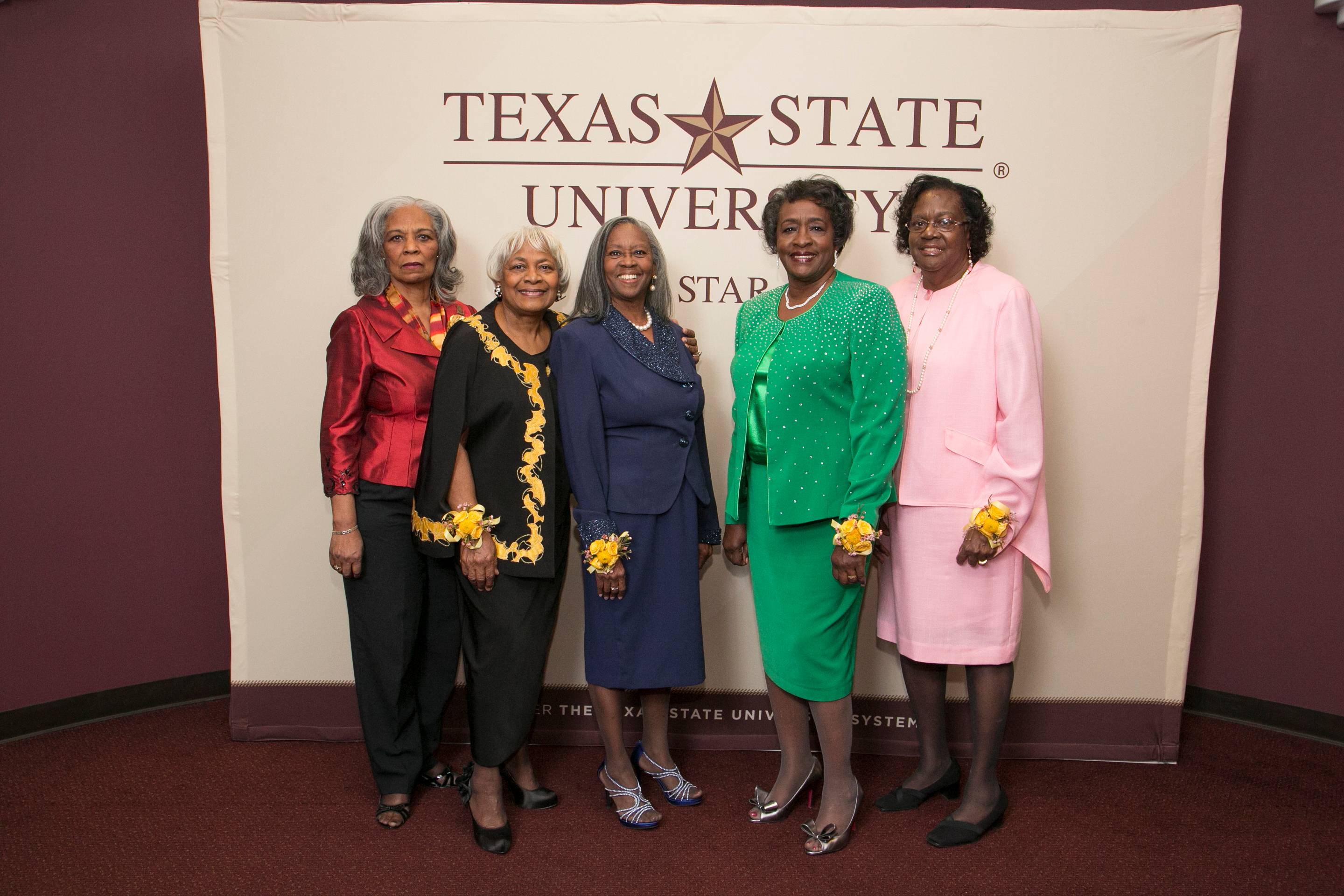 From left to right, Dana Jean Smith, Helen Jackson Franks, Georgia Hoodye Cheatham, Gloria Odoms Powell, and Mabeleen Washington pictured during a return to TXST in 2014.