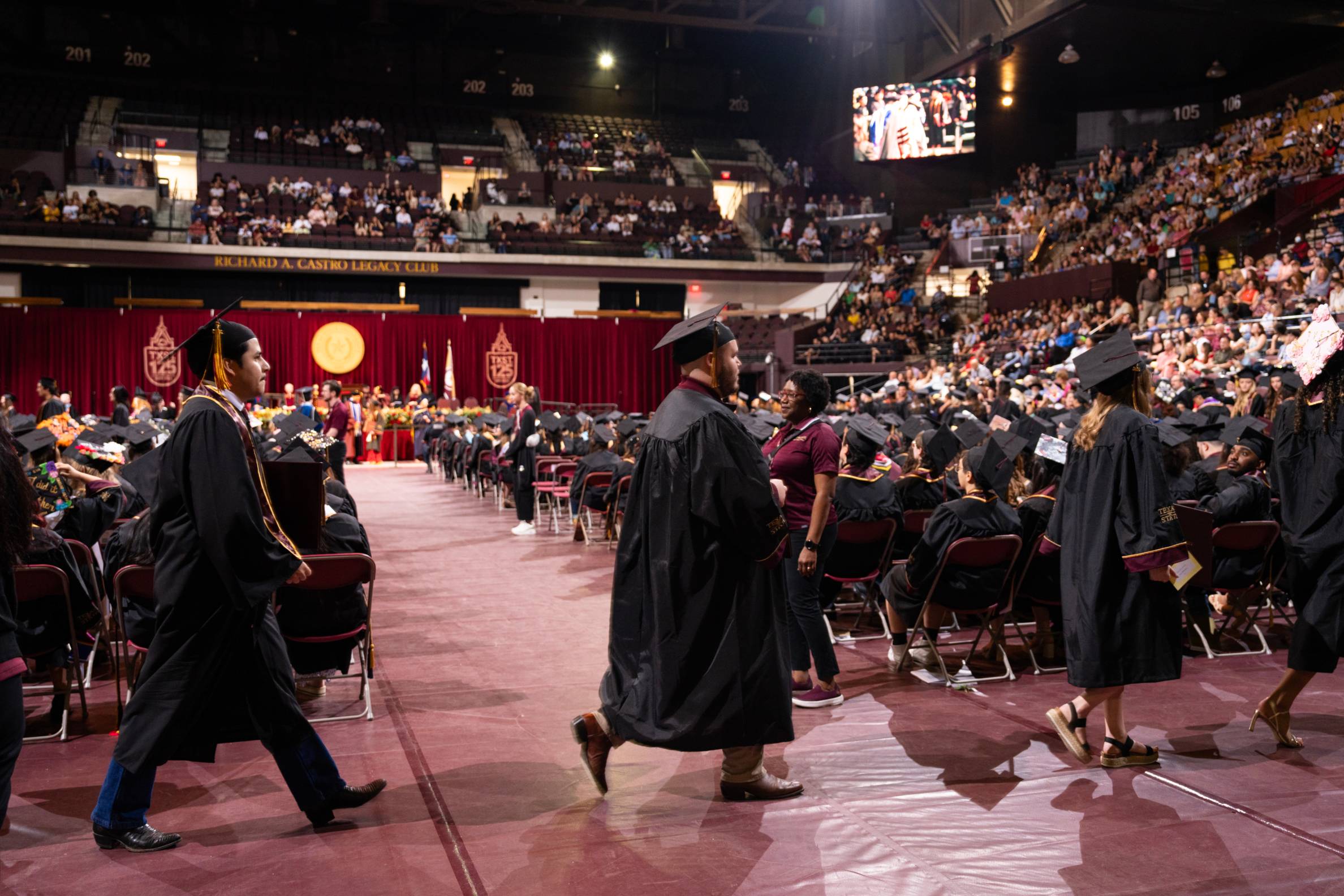 Students walking at graduation