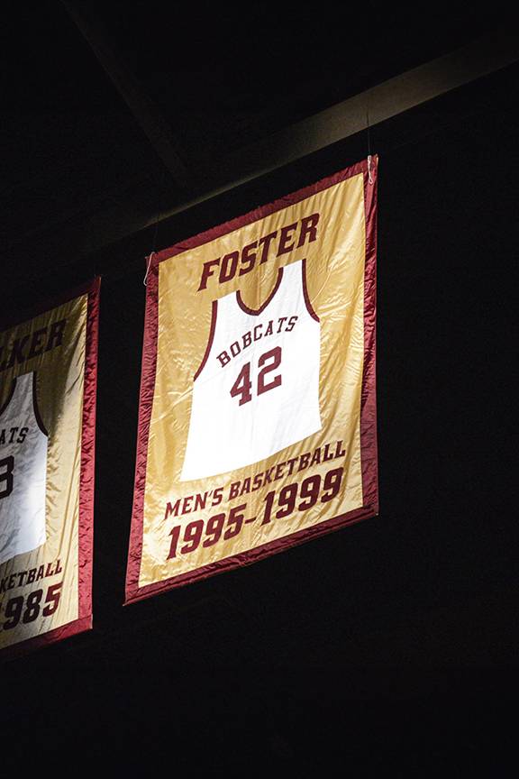 Texas State Hall of Fame banner for men's basketball team member, Jeff Foster, #42, dated 1995-1999.