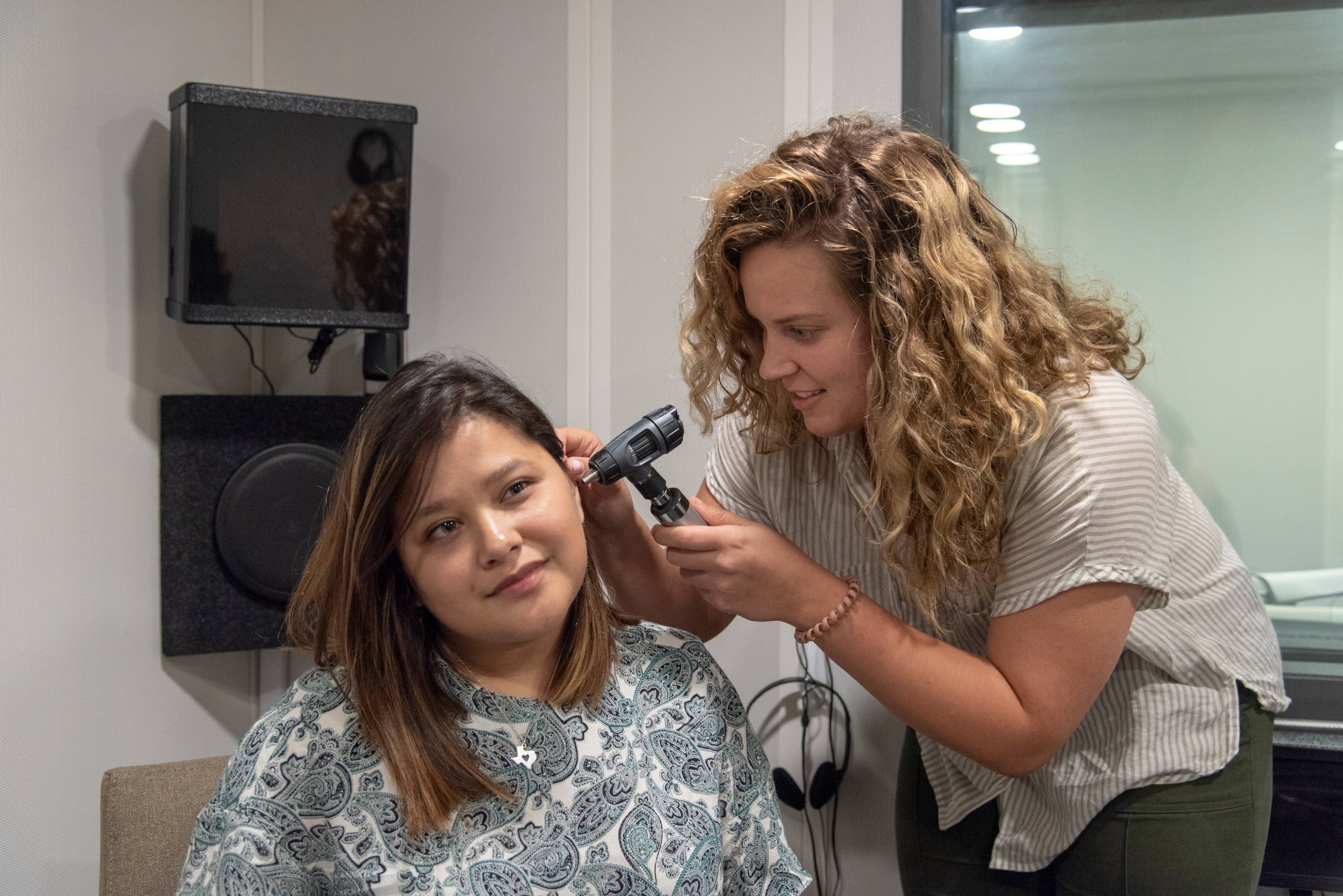 Students practice ear examinations at the Texas State Speech-Language-Hearing Clinic in Round Rock.