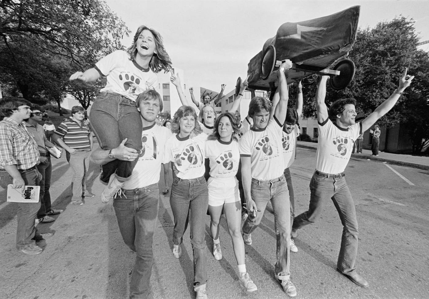 Students celebrate after the annual Soapbox Derby, circa 1970.