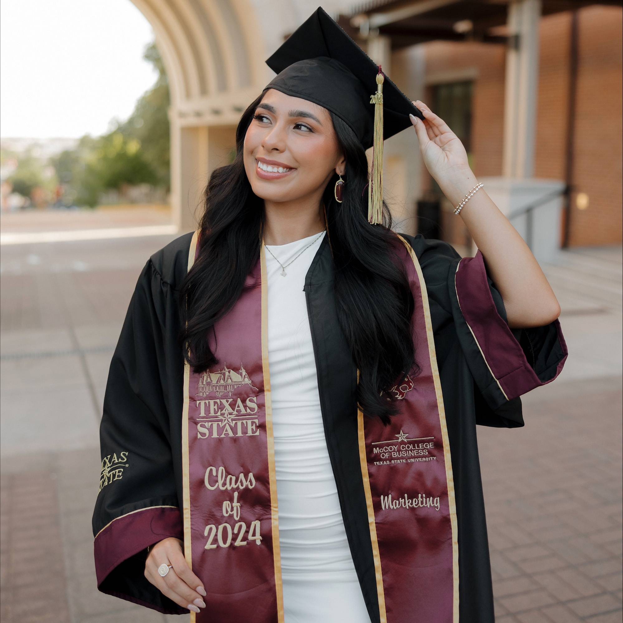 Lizette Garcia in graduation regalia