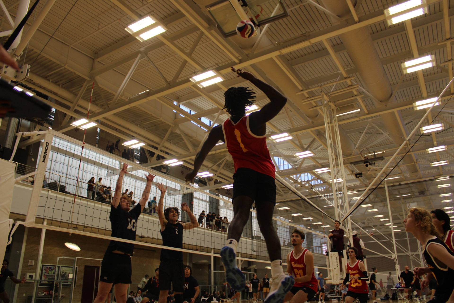 Men's Volleyball player attempting a spike