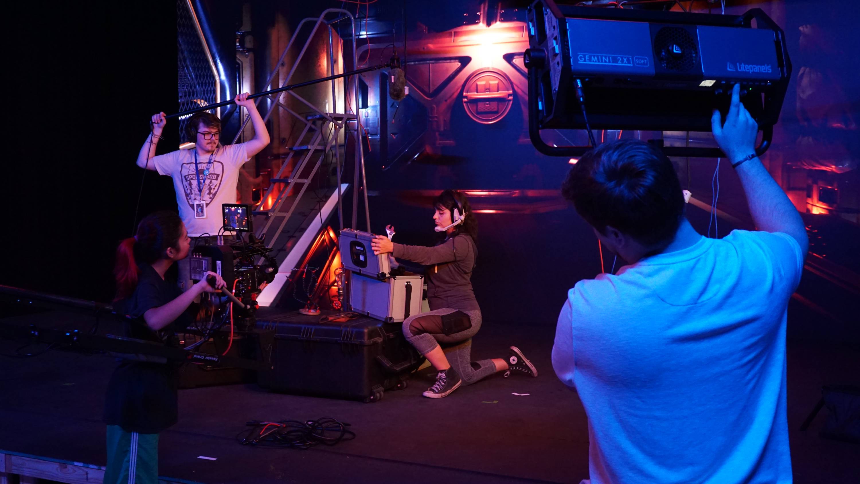 Students filming a scene in front of a virtual backdrop at the ALIAS Virtual Production Studio at the San Marcos Campus of Texas State University.