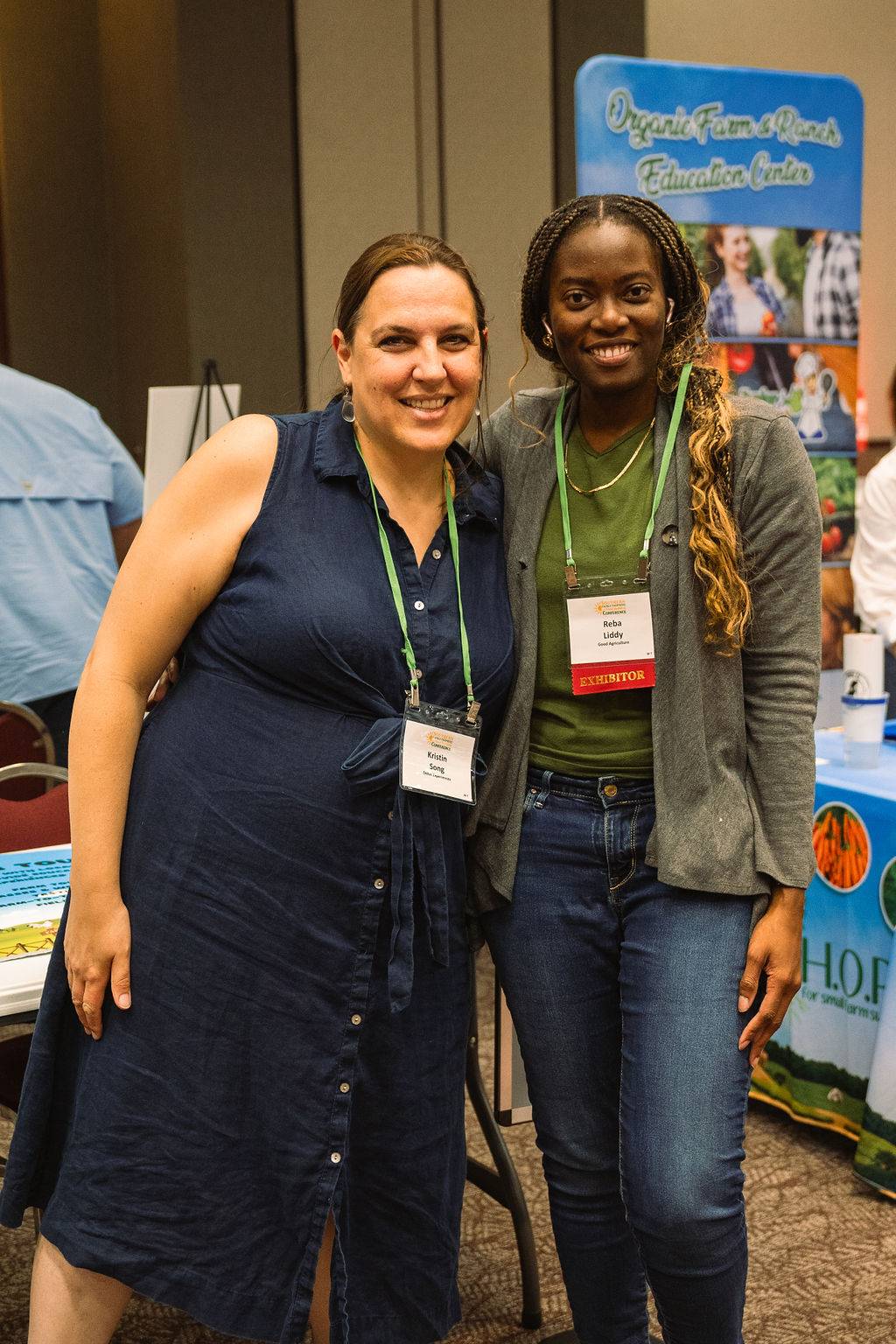 Two women smiling at the camera