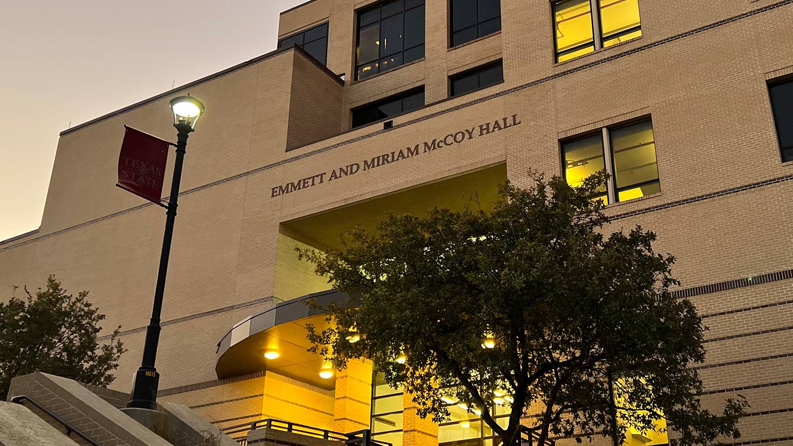 McCoy Hall entrance at dusk