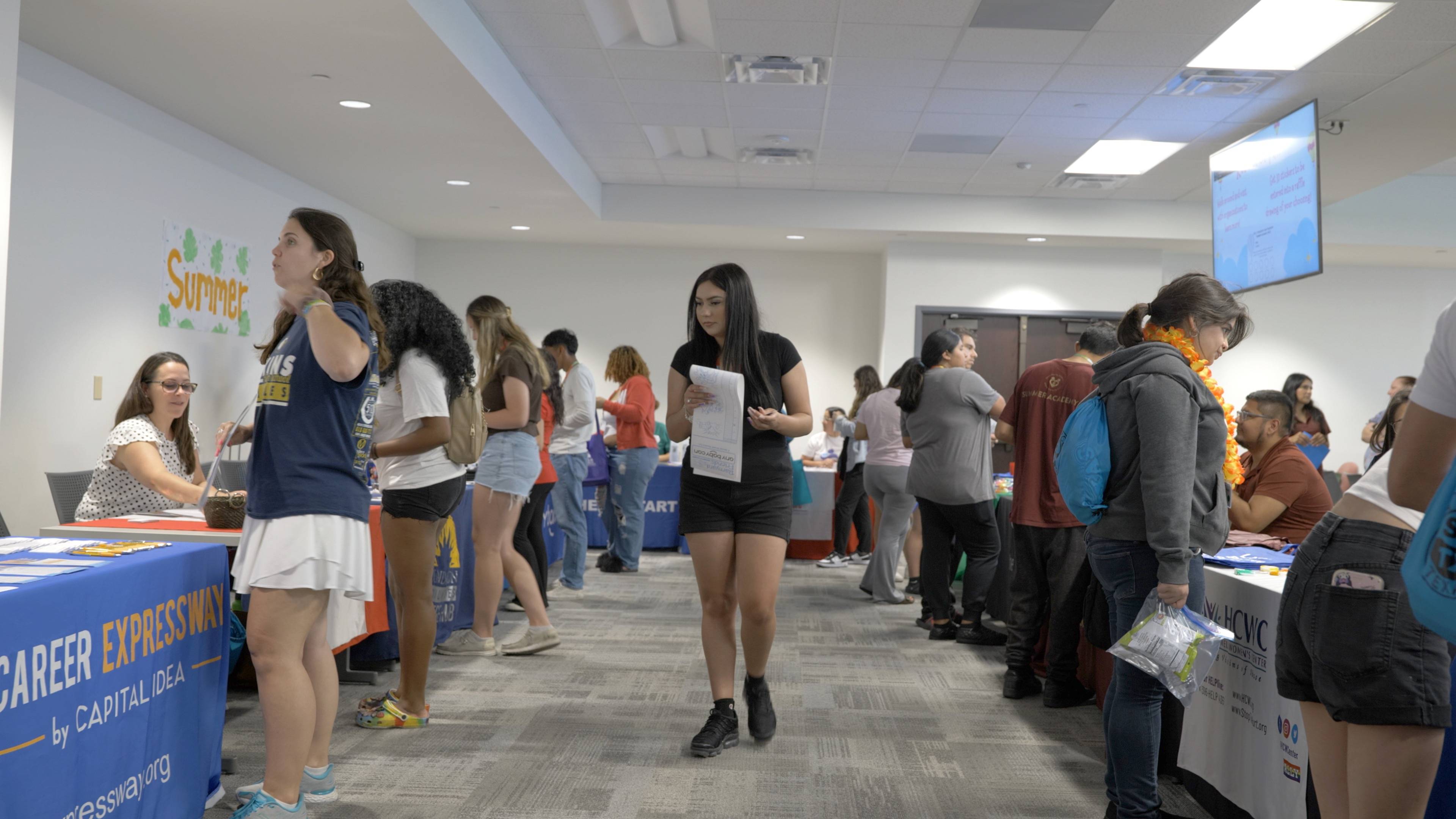 SR/SF participants engaging in resource fair at Summer Academy