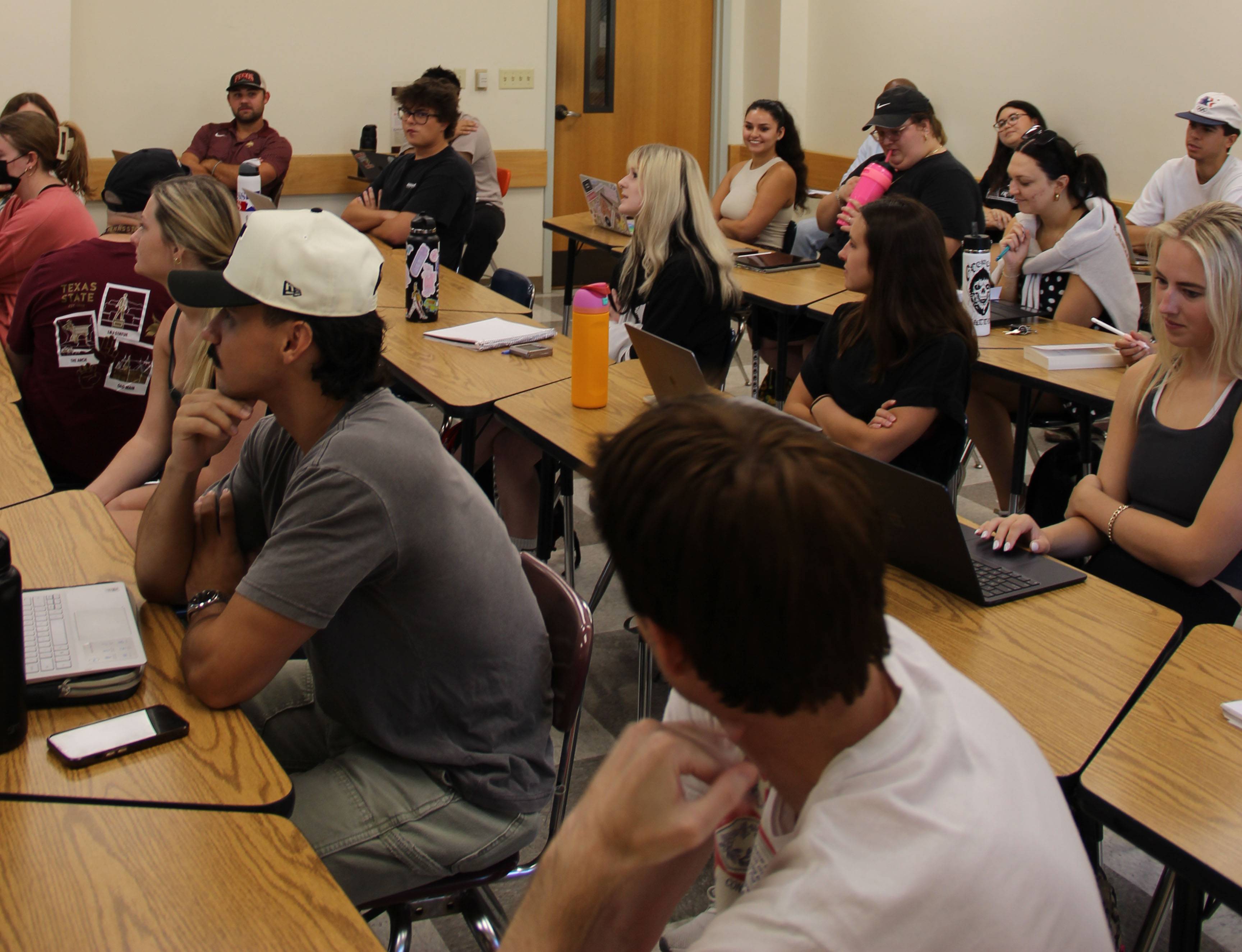 students in a classroom at their desks