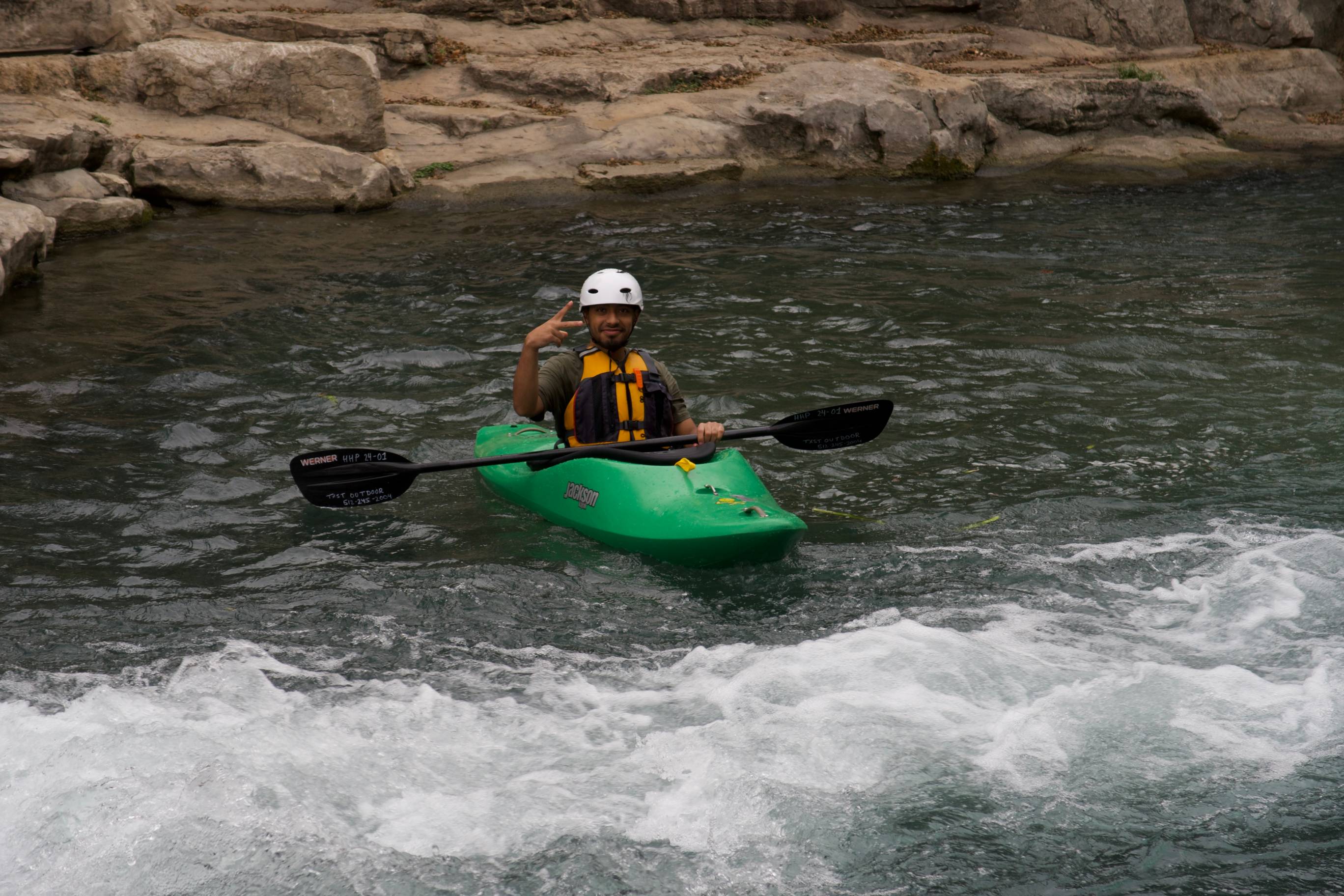 Student whitewater kayaking