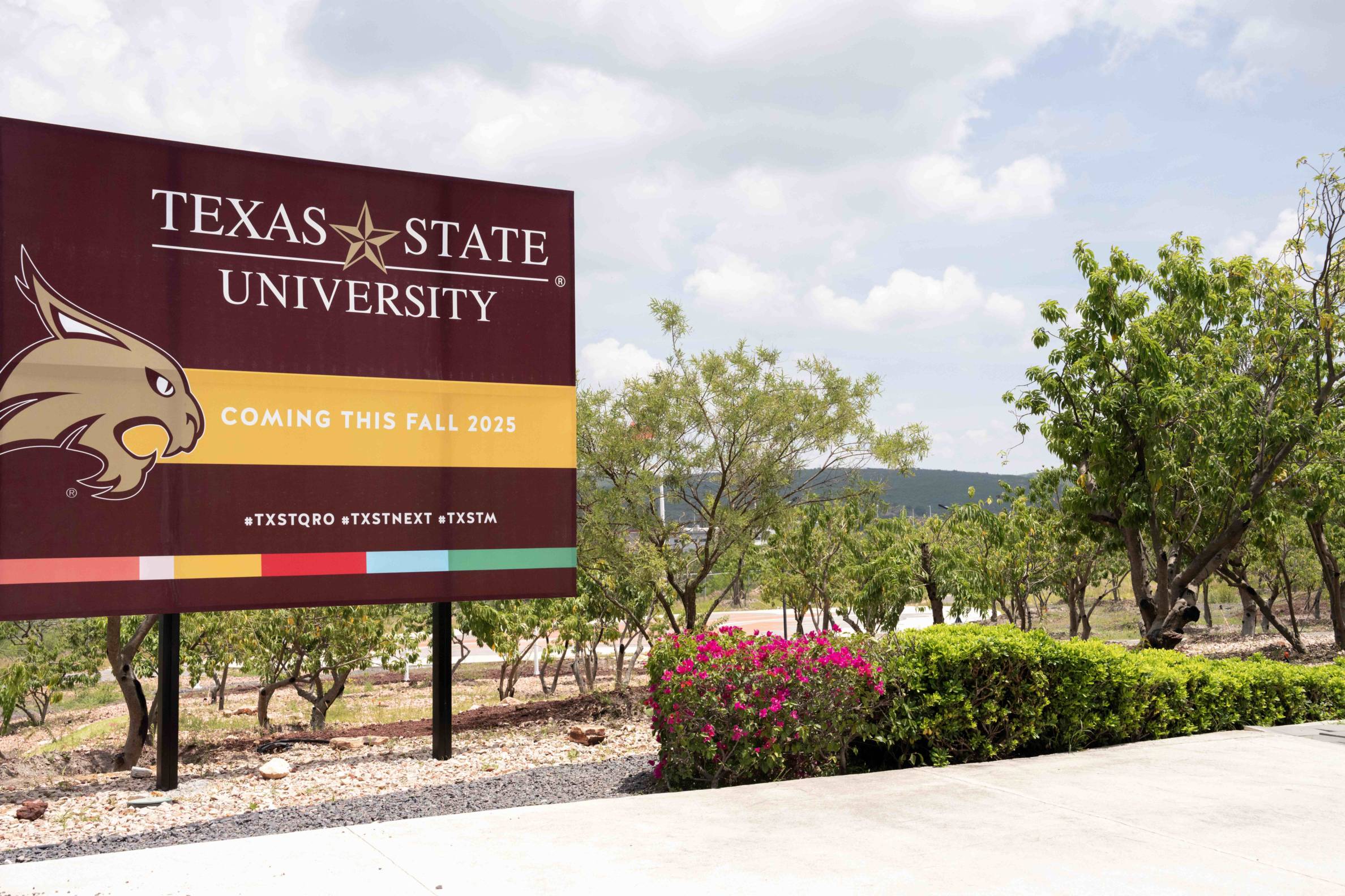 Billboard proclaiming the arrival of a new TXST campus coming in Fall 2025