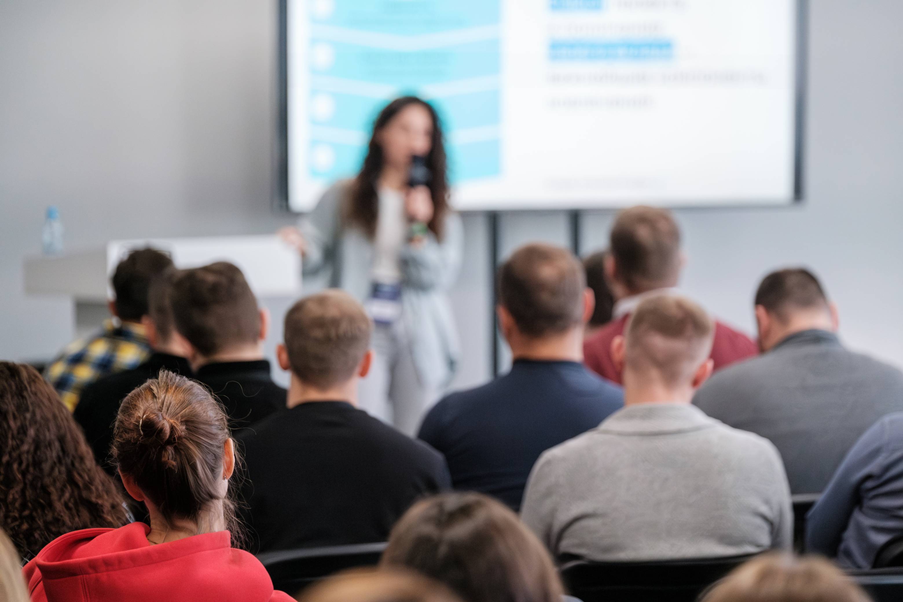 Group of people attending a presentation