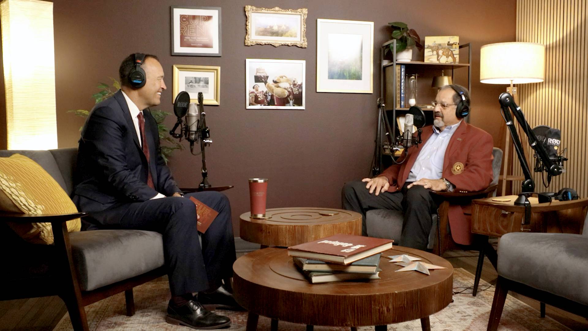 two men are speaking while recording a podcast episode