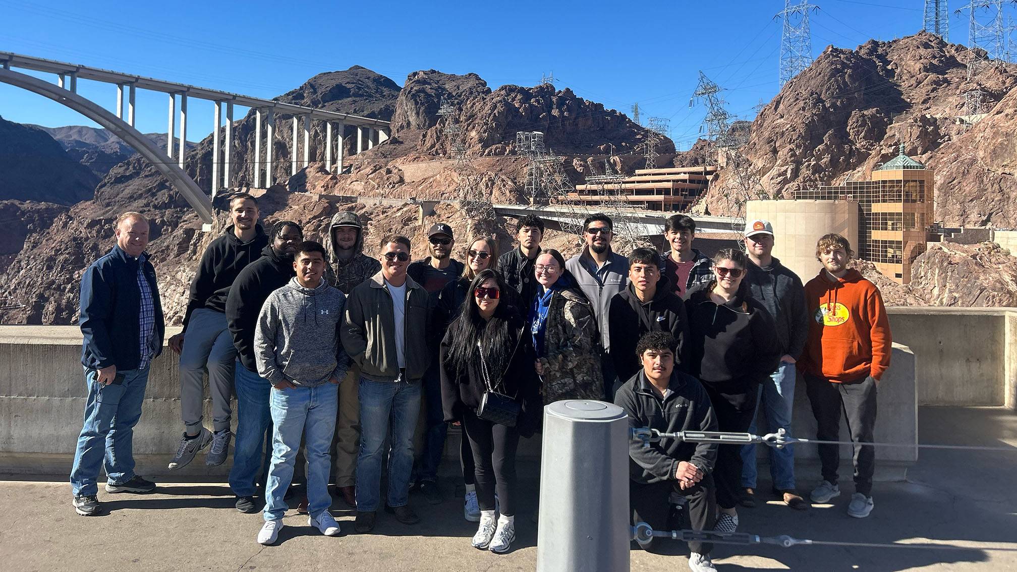 The CIM students pose for a photo at the Hoover Dam.