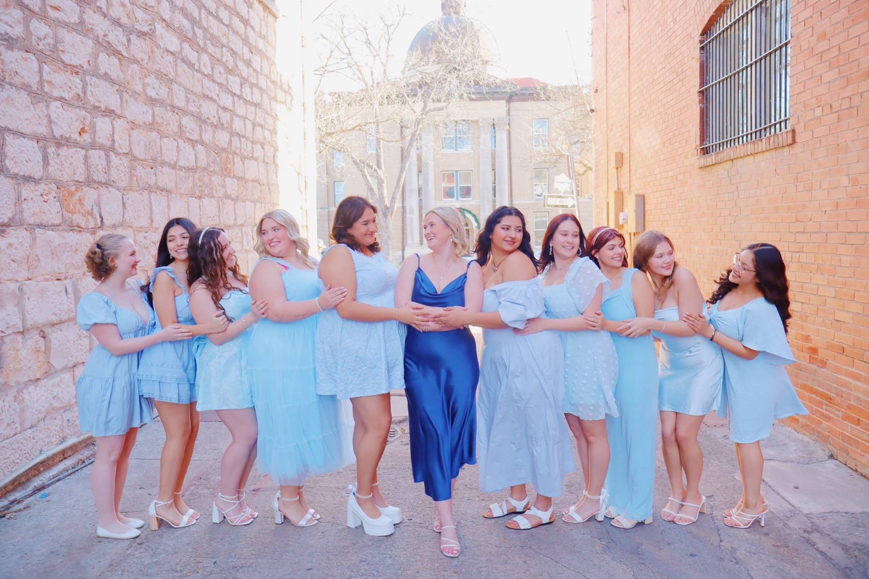 Women of Alpha Gamma Delta walking on a trail