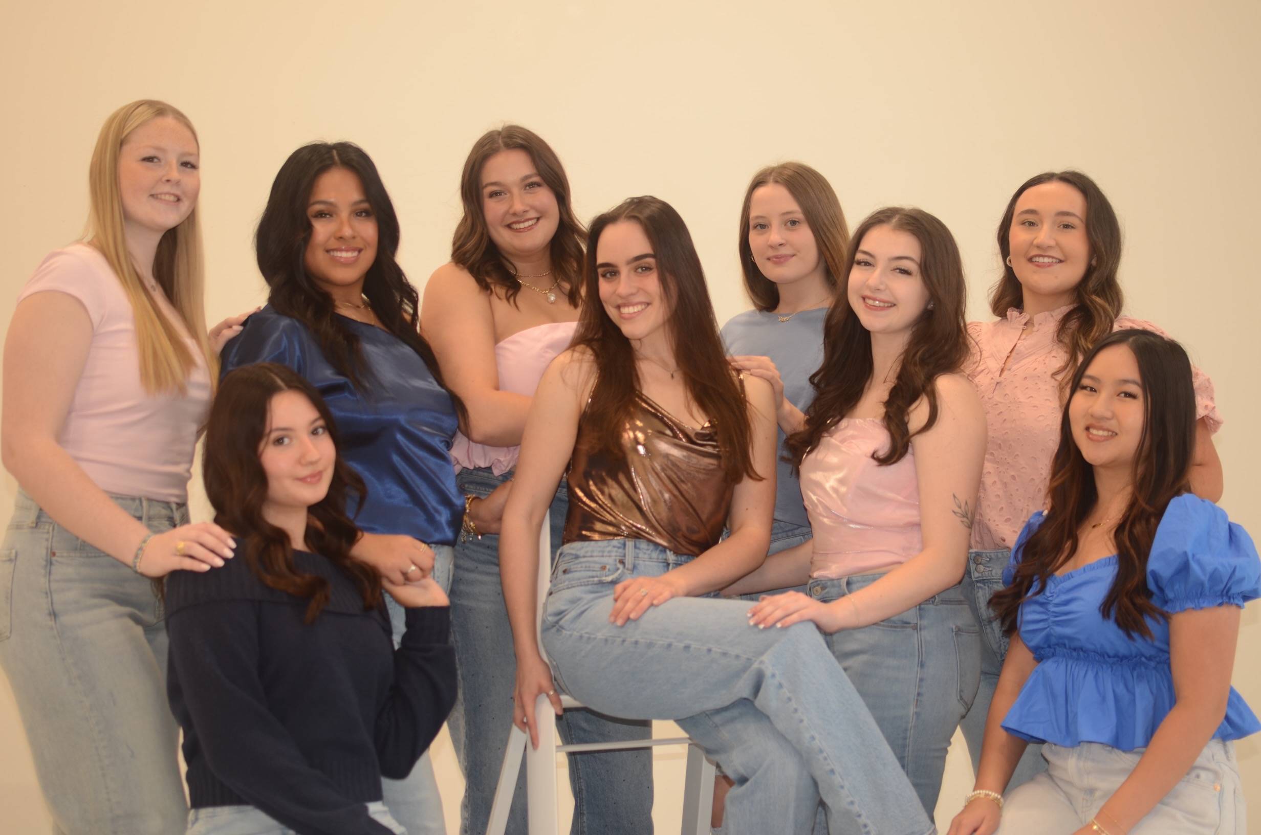 The executive board of Delta Gamma posing in group.