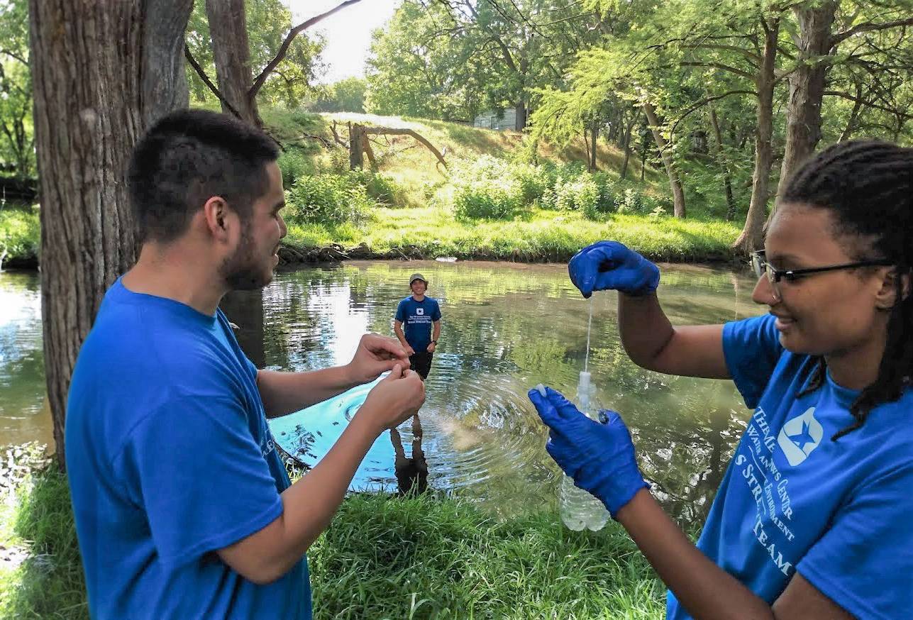 aquatic science researchers collecting water samples