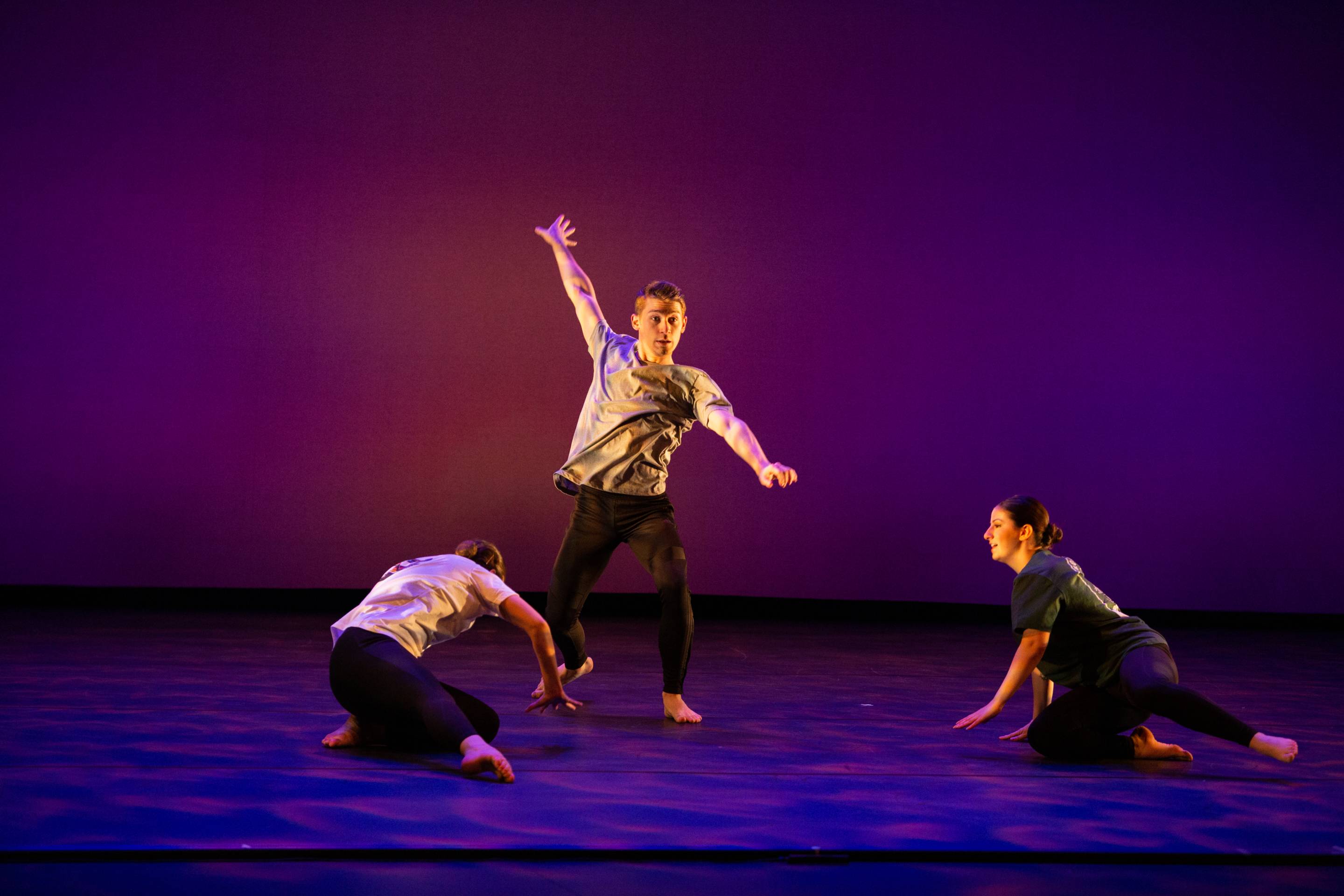 a stage with students dancing