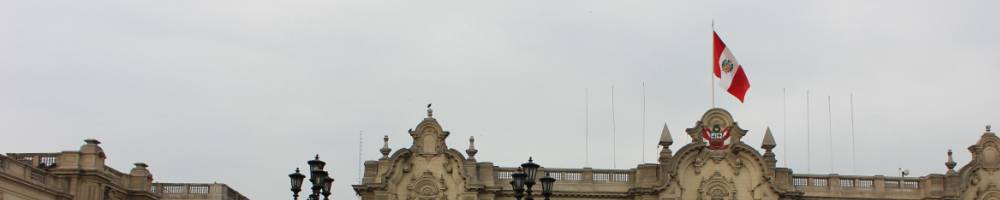 Peruvian flag on top of building