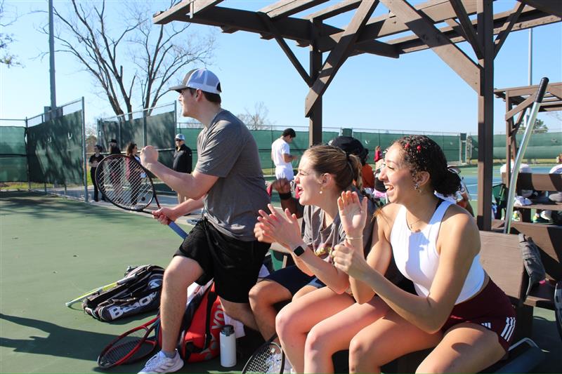 tennis sport club cheering after winning a match