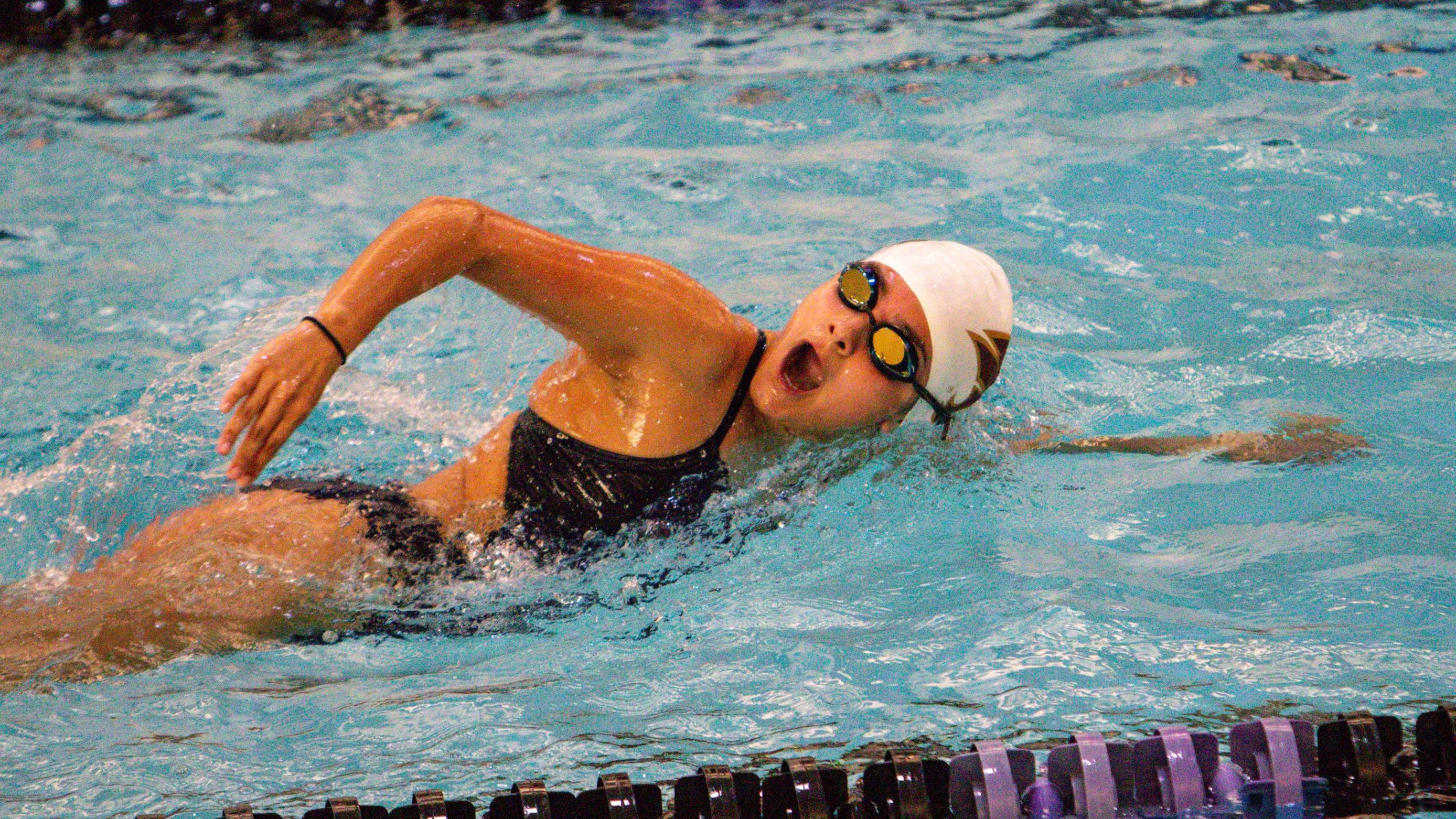 swim sport club member competing in race